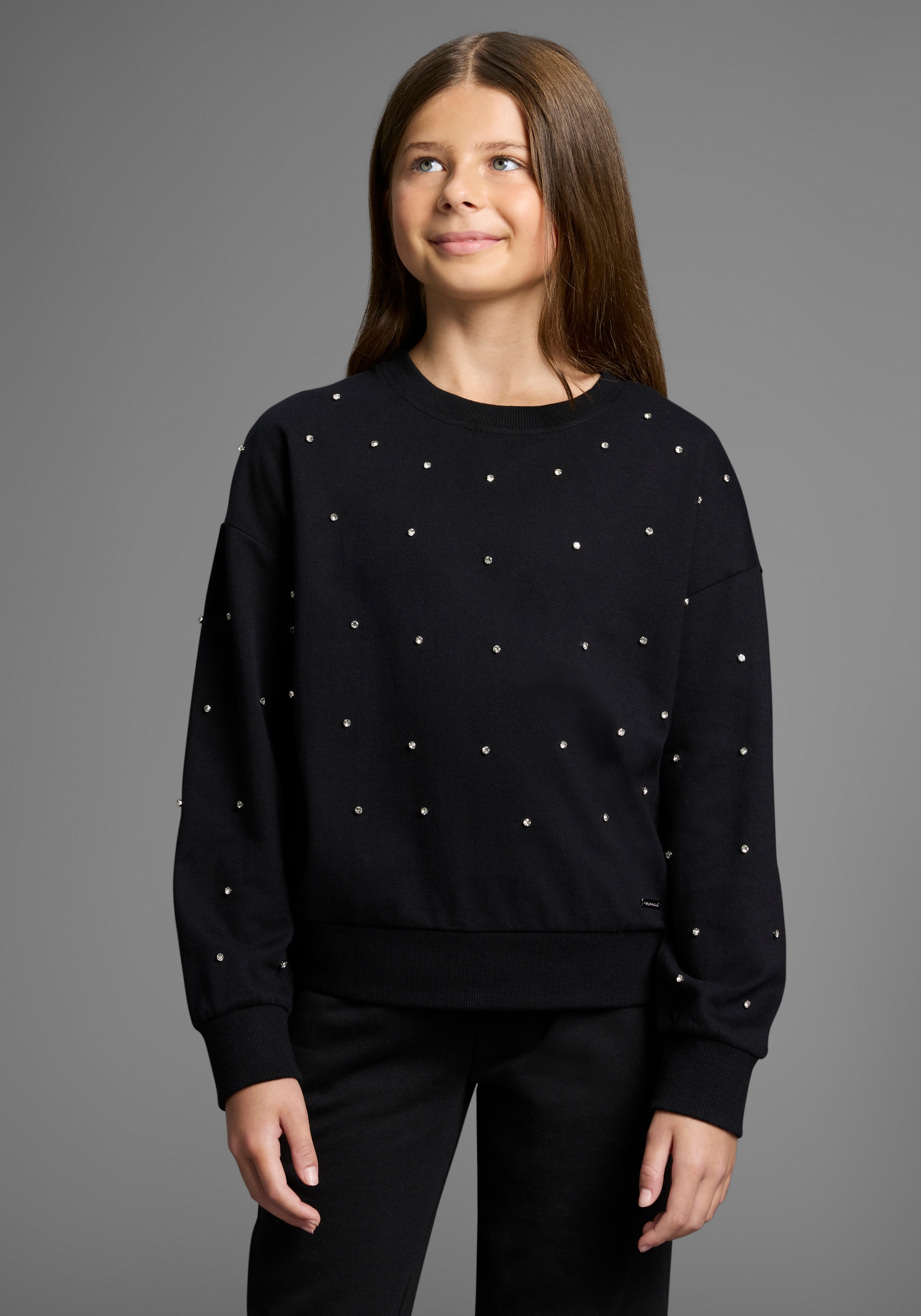Bruno Banani Sweatshirt "Kurzgeschnittenes Sweatshirt mit Strass-Steinen", Für TEENS. Trendiges Shirt mit Strass-Steinen