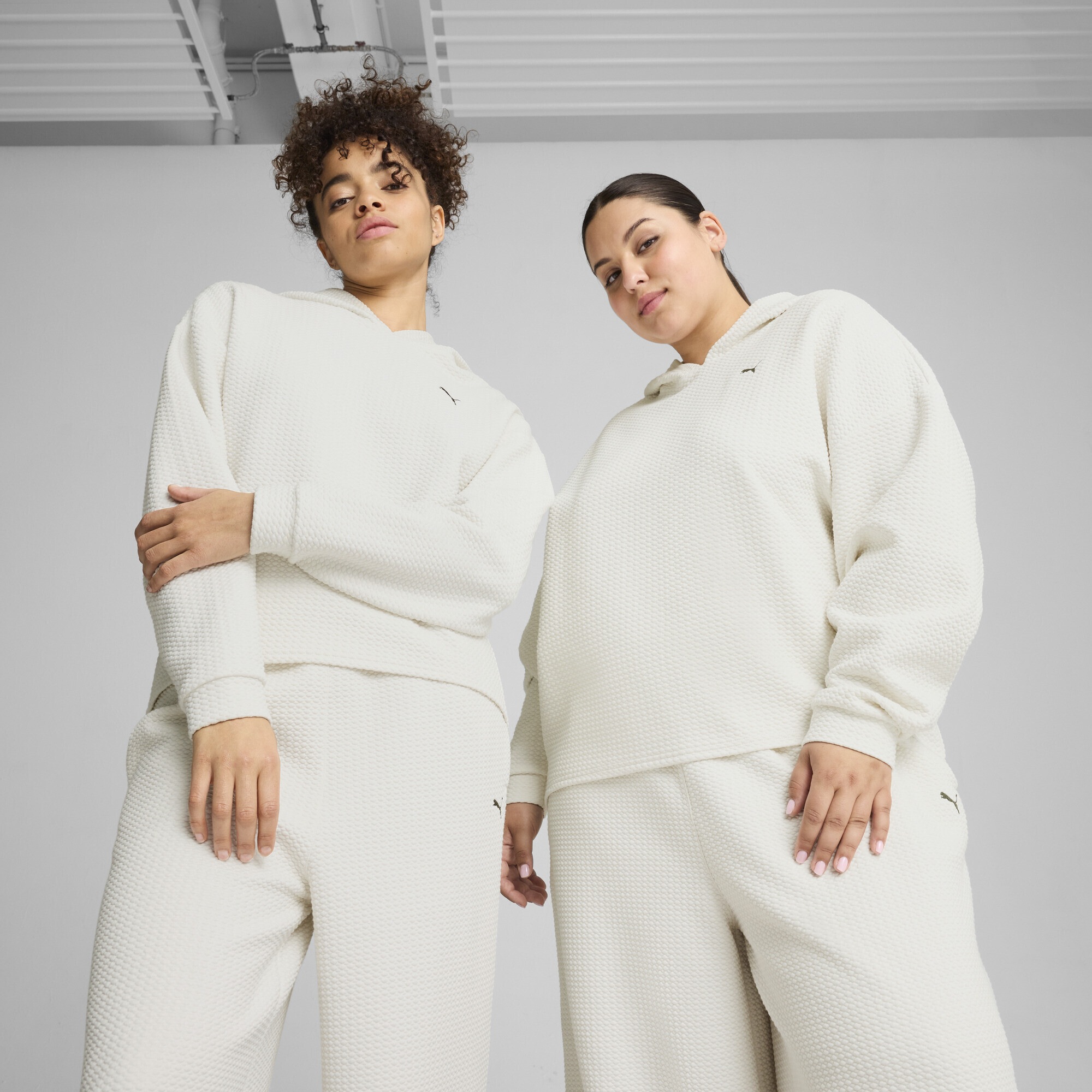 PUMA Kapuzenpullover »STUDIO Textured Hoodie Damen«