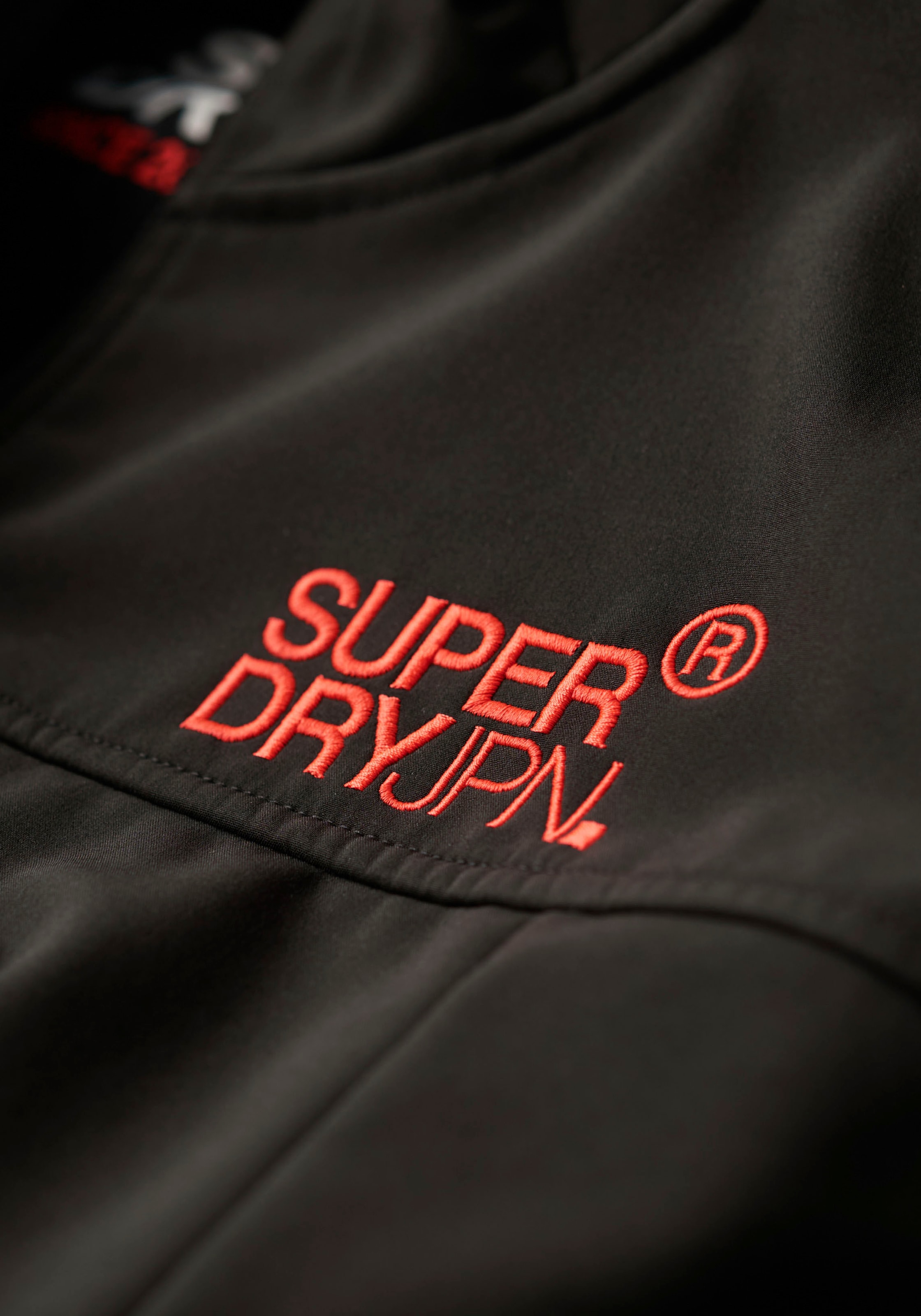Superdry Outdoorjacke »HOODED SOFT SHELL TREKKER JKT«, mit Kapuze