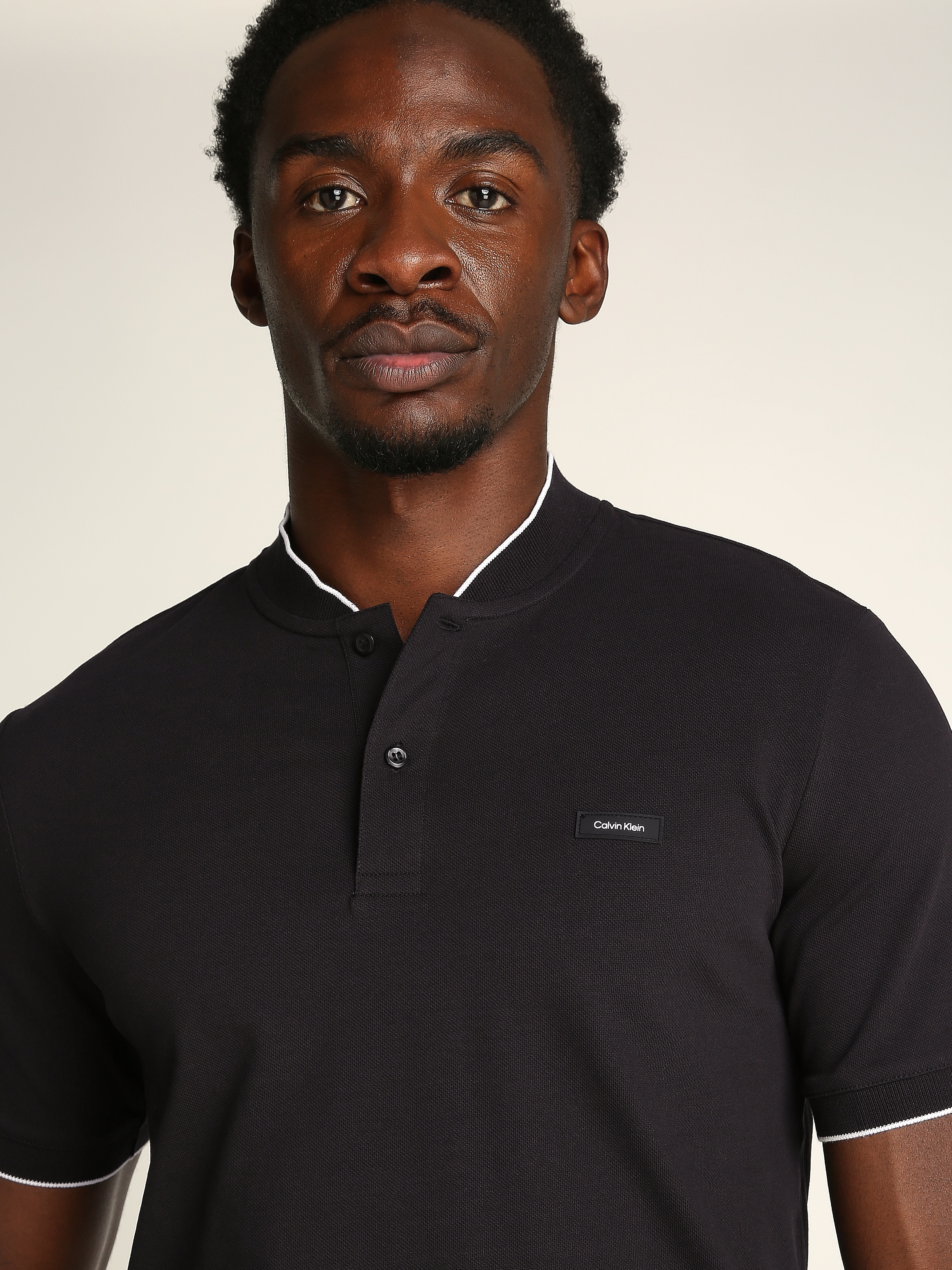 Calvin Klein Poloshirt »STRETCH PIQUE STAND COLLAR POLO«, mit kontrastfarbenen Kanten