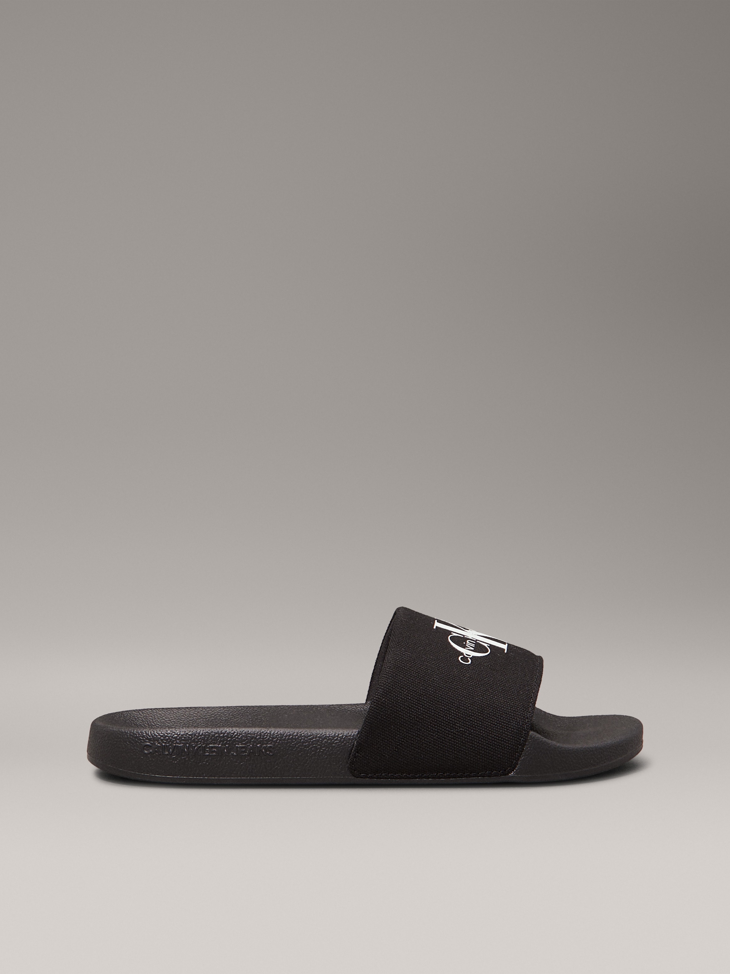 Calvin Klein Jeans Pantolette »SLIDE MONOGRAM WMNS«, Poolslides, Schlappen, Sommerpantolette, Strandschuh zum Schlupfen