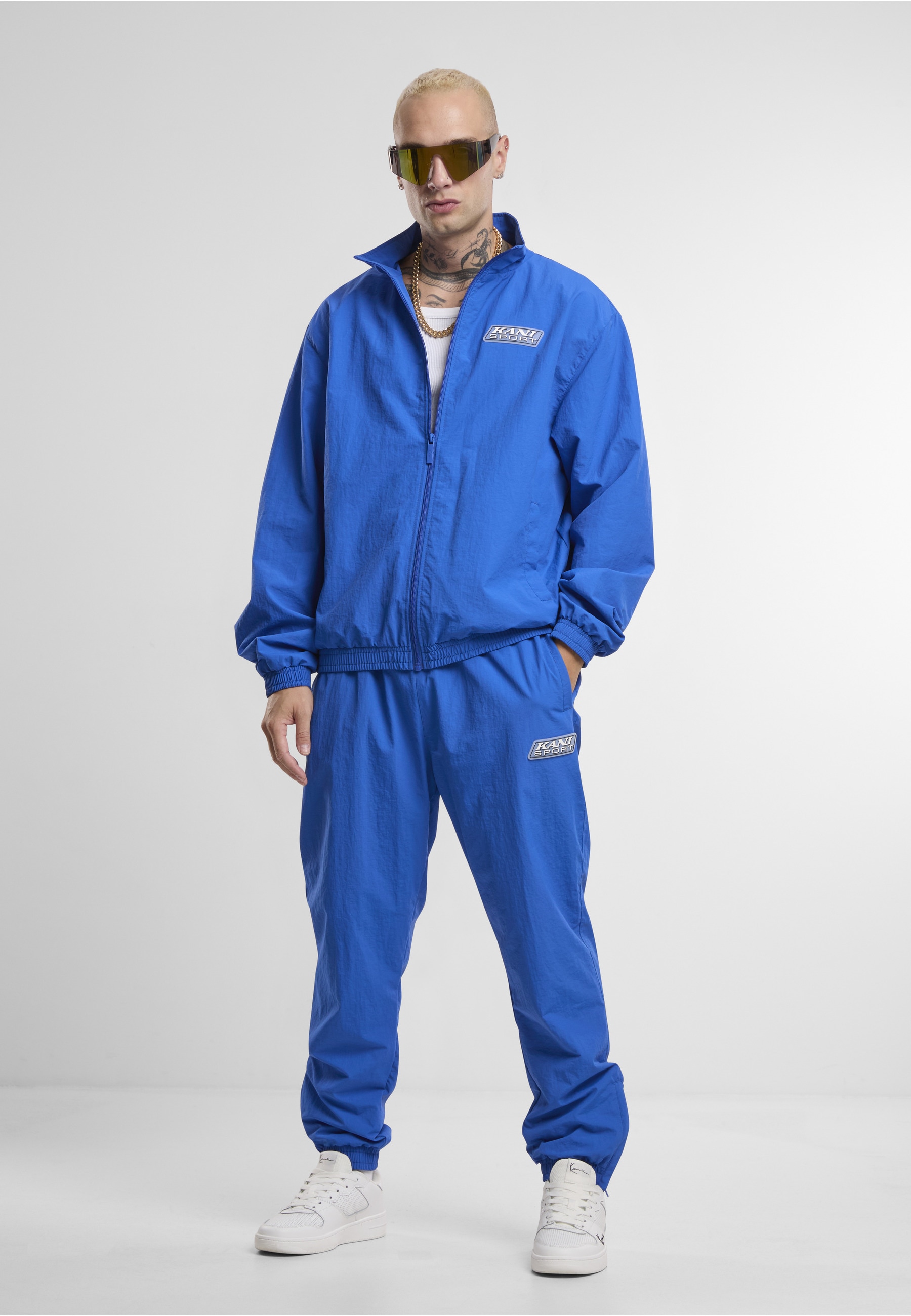 Karl Kani Trainingsjacke »Karl Kani Sport Patch Essential Trackjacket« 1 Stk. tlg. ohne Kapuze