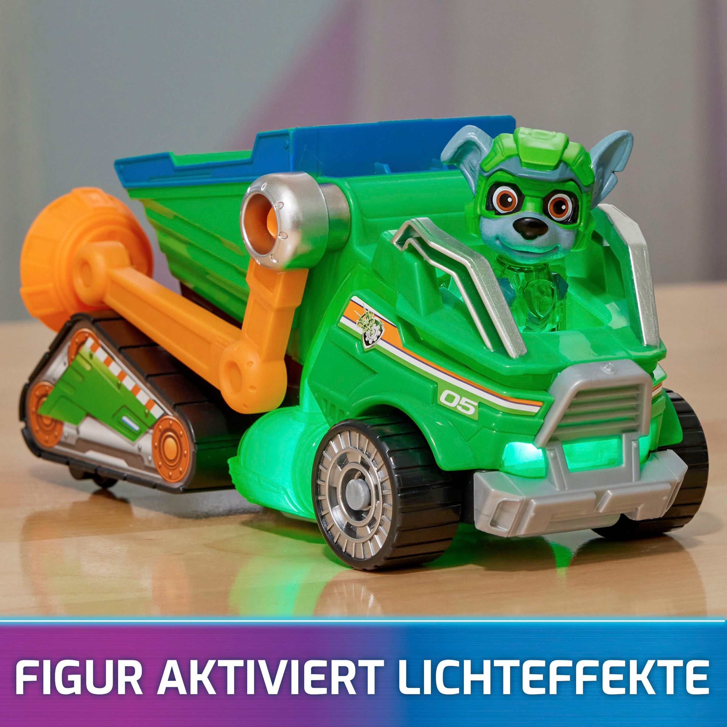 Spin Master Spielzeug-Auto »Paw Patrol - Movie II - Basic Themed Vehicles Rocky«, Mülltransporter mit Welpenfigur, Licht- und Soundeffekt