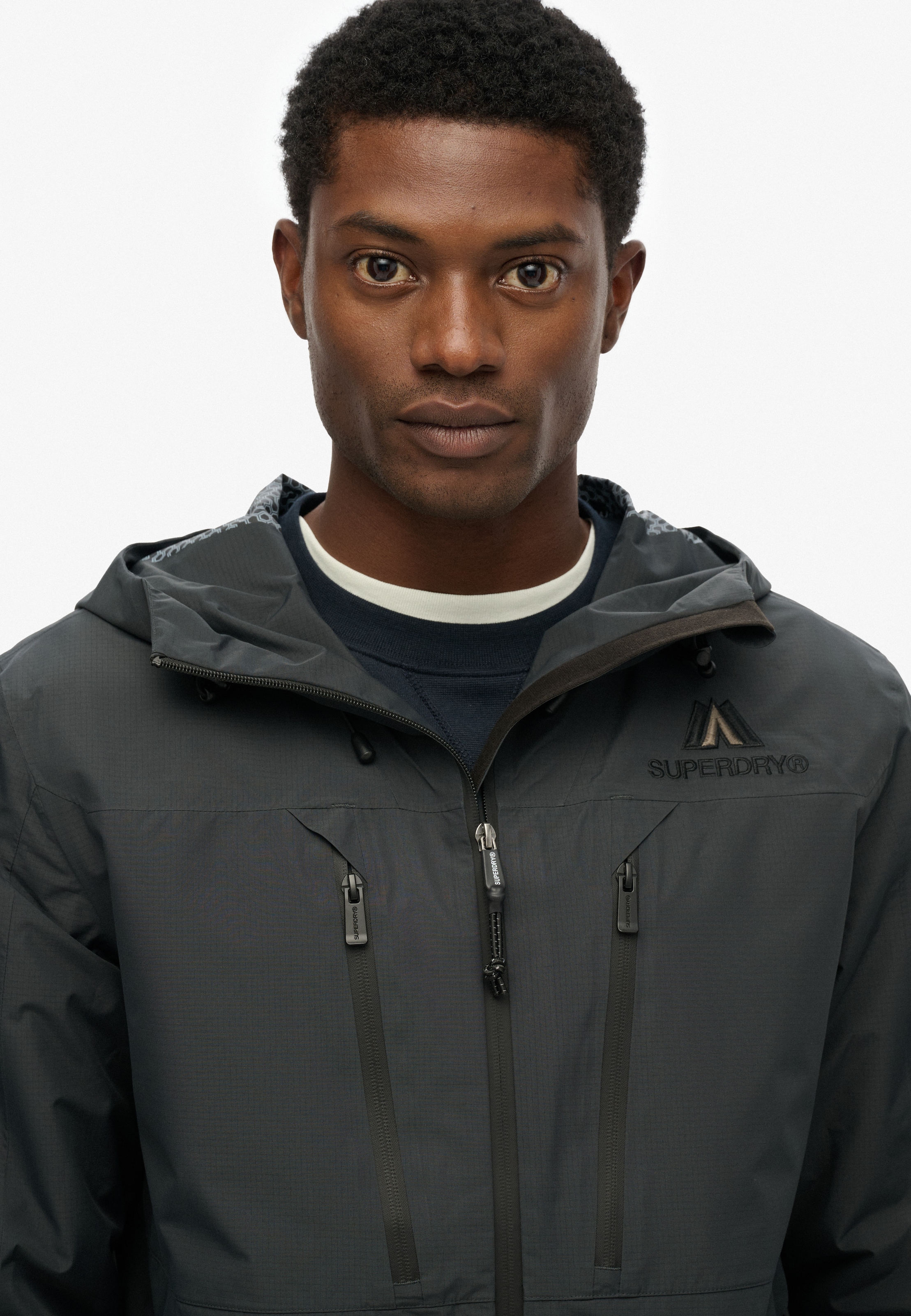 Superdry Outdoorjacke »WATERPROOF JACKET«, mit Kapuze, Wasserdicht (Säule wird nachgereicht)