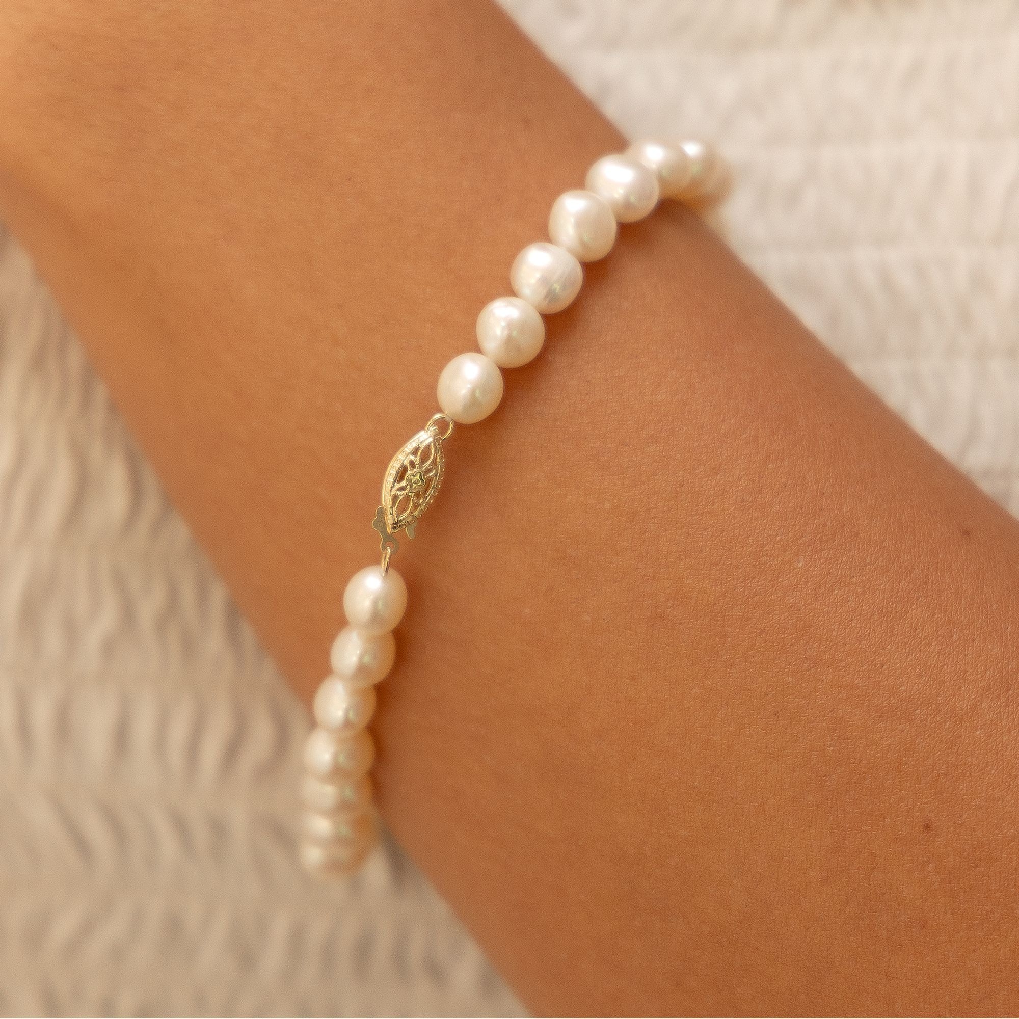 Fascination by Ellen K. Armband »Gold 585 mit weißen Perlen 20cm«
