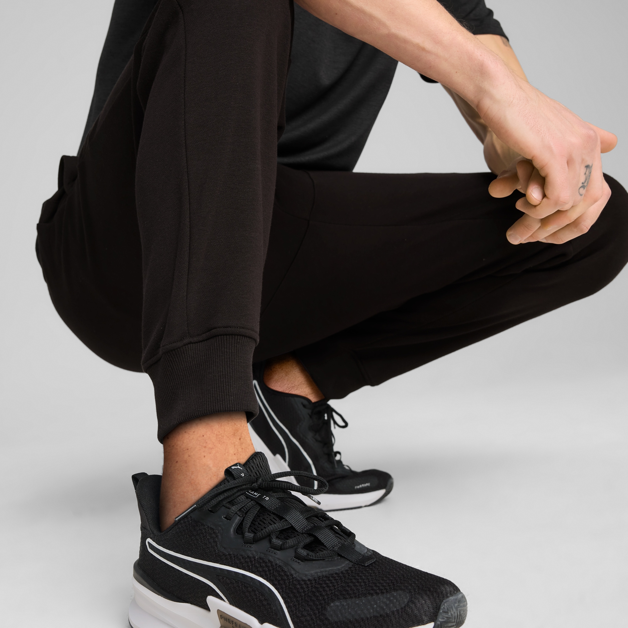 PUMA Trainingshose »M TAD ESSENTIALS FRENCH TERRY JOGGER«