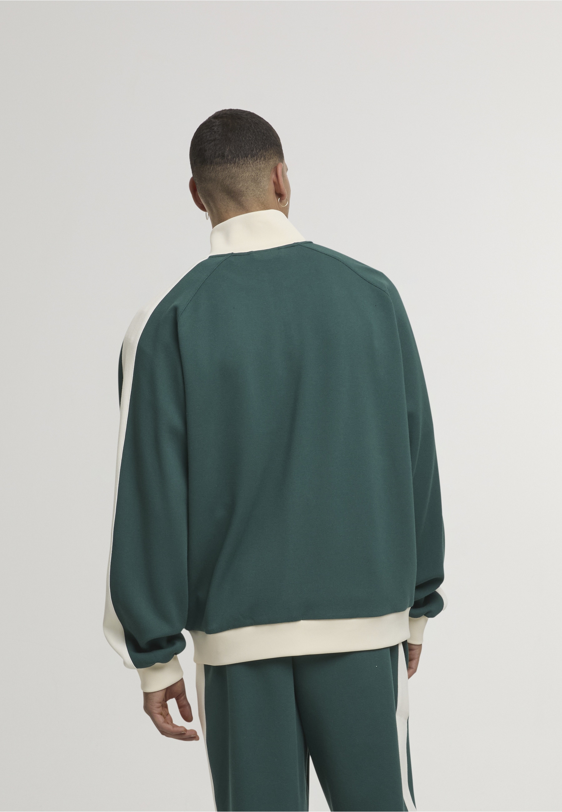 Karl Kani Outdoorjacke »Karl Kani Signature Sidestripe Pique Trackjacket« 1 Stk. tlg. ohne Kapuze