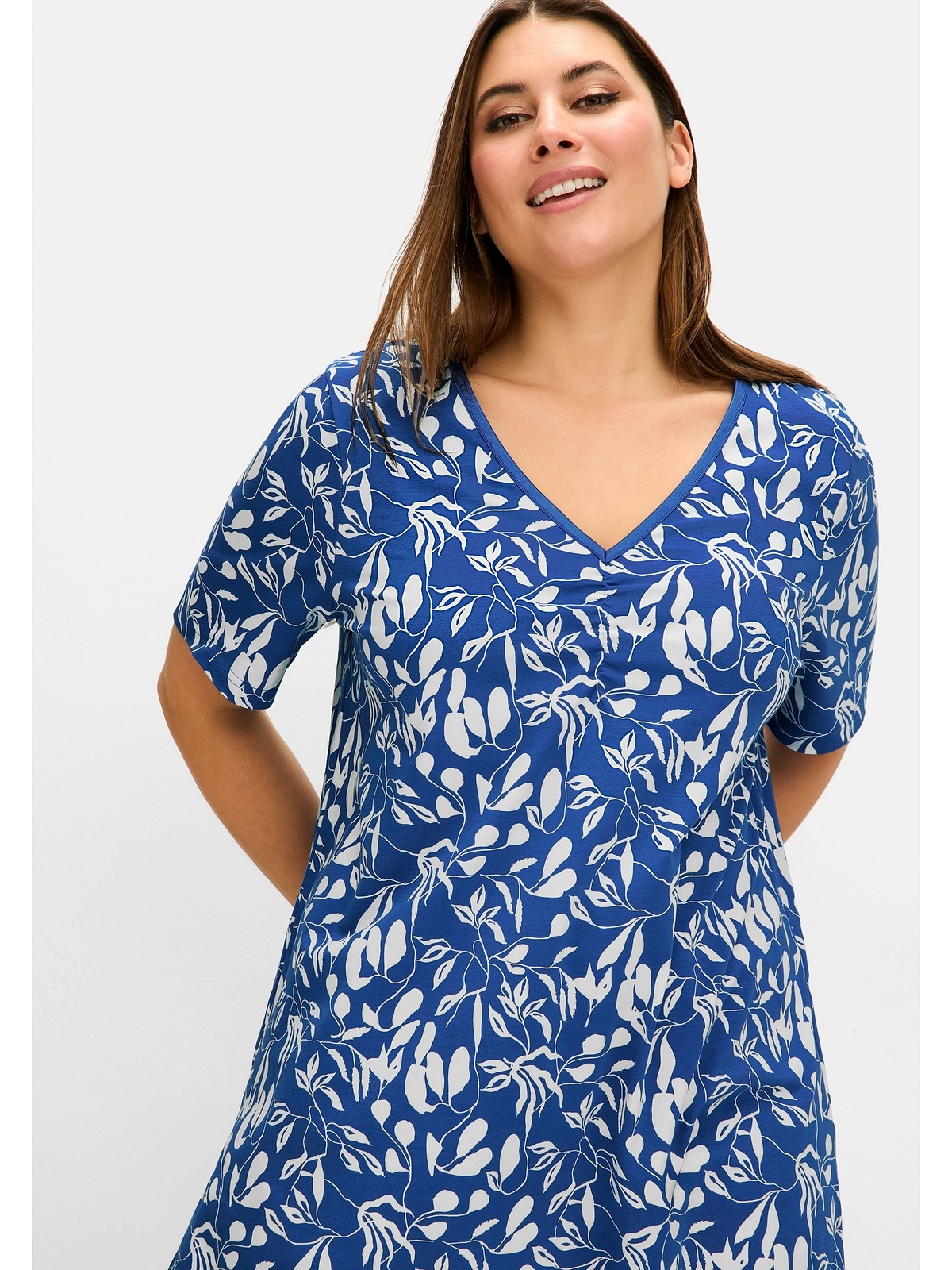 Sheego T-Shirt »Große Größen«, mit Blumendruck, in leichter A-Linie