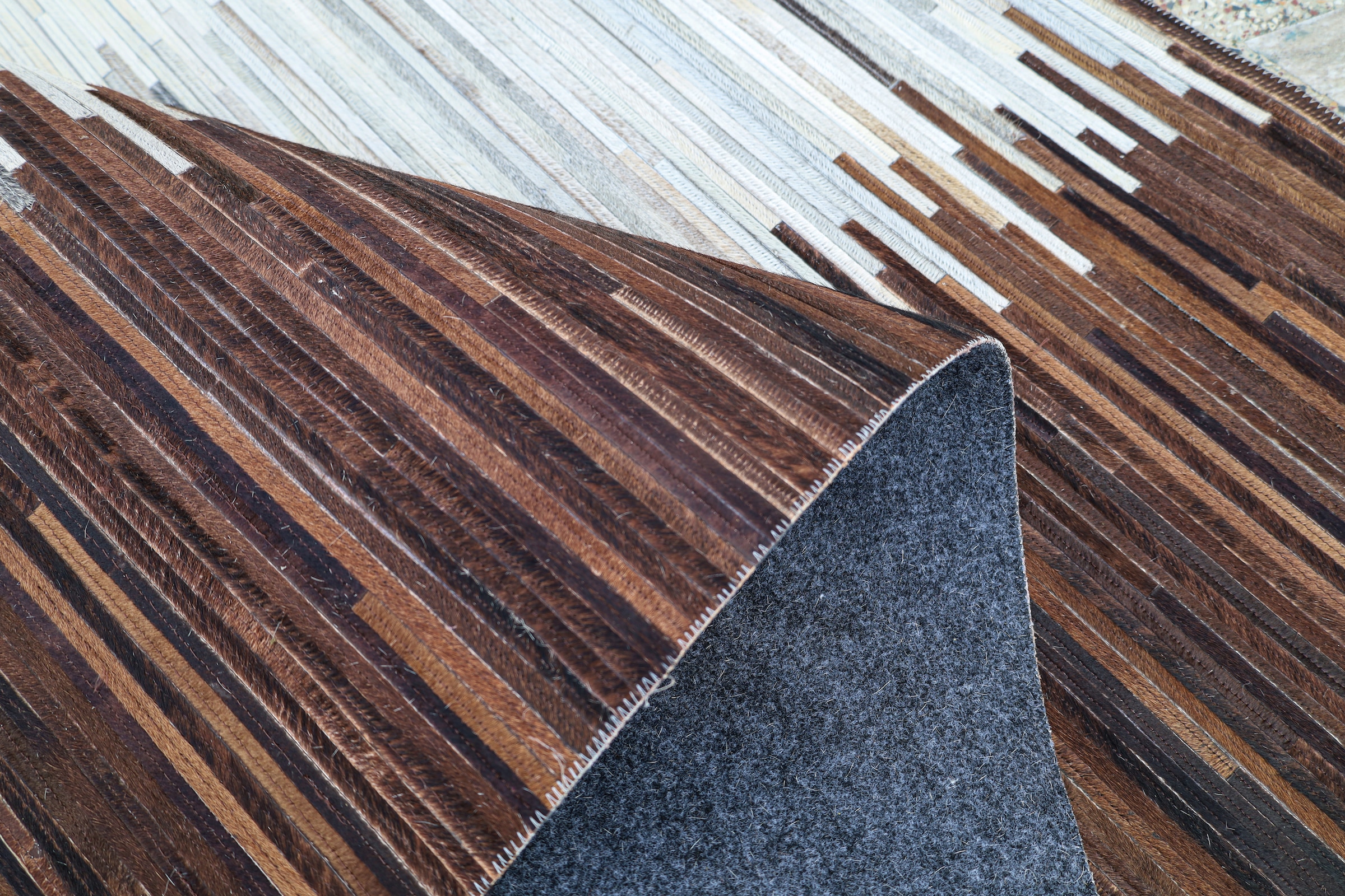 Myflair Möbel & Accessoires Fellteppich »Urban Hide, echtes Rinderfell« rechteckig 10 mm Höhe handgenäht, Naturprodukt, natürliche Struktur & Premium-Look