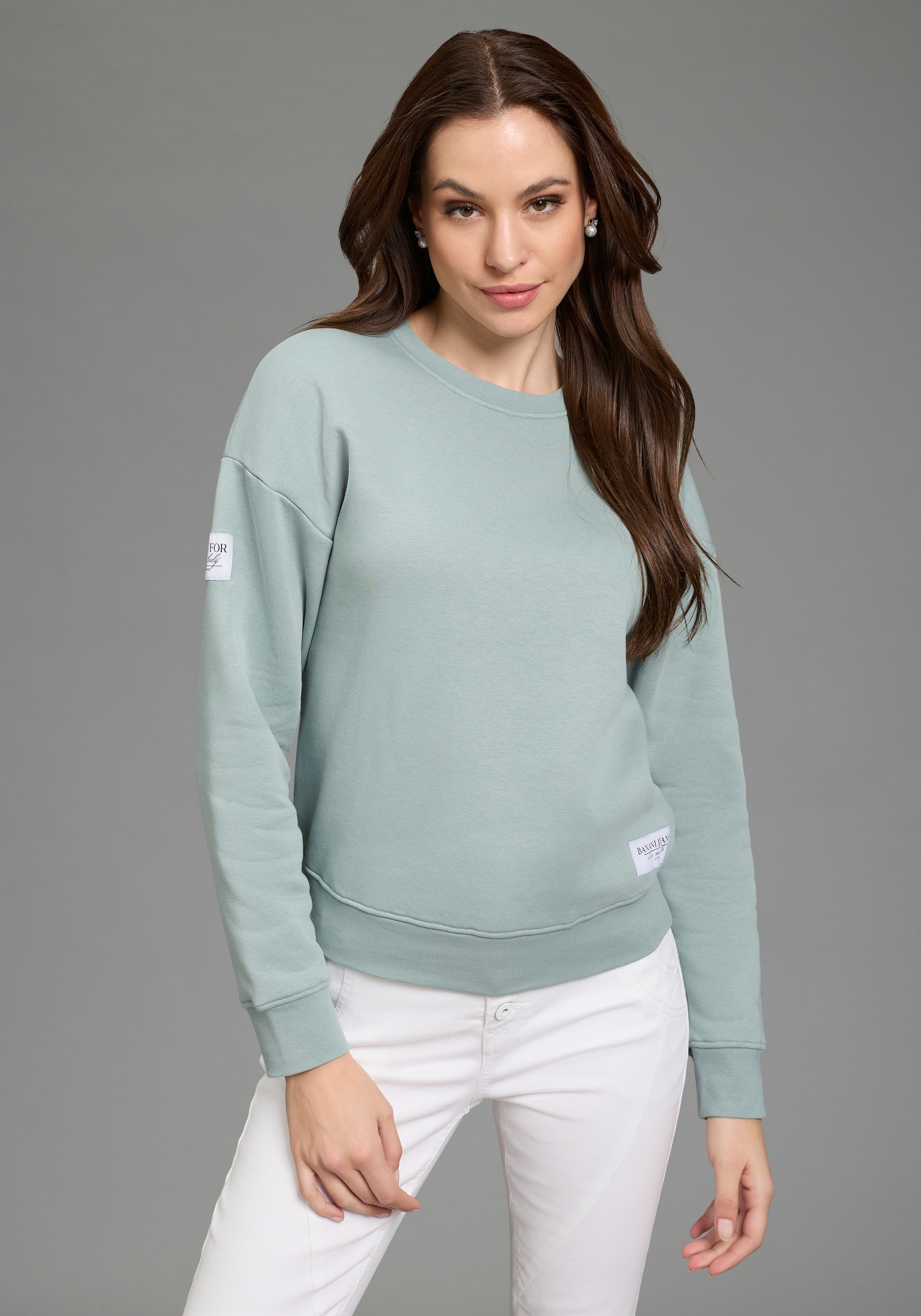 Bruno Banani Sweatshirt, mit Rundhalsausschnitt und platzierten Weblabels günstig online kaufen