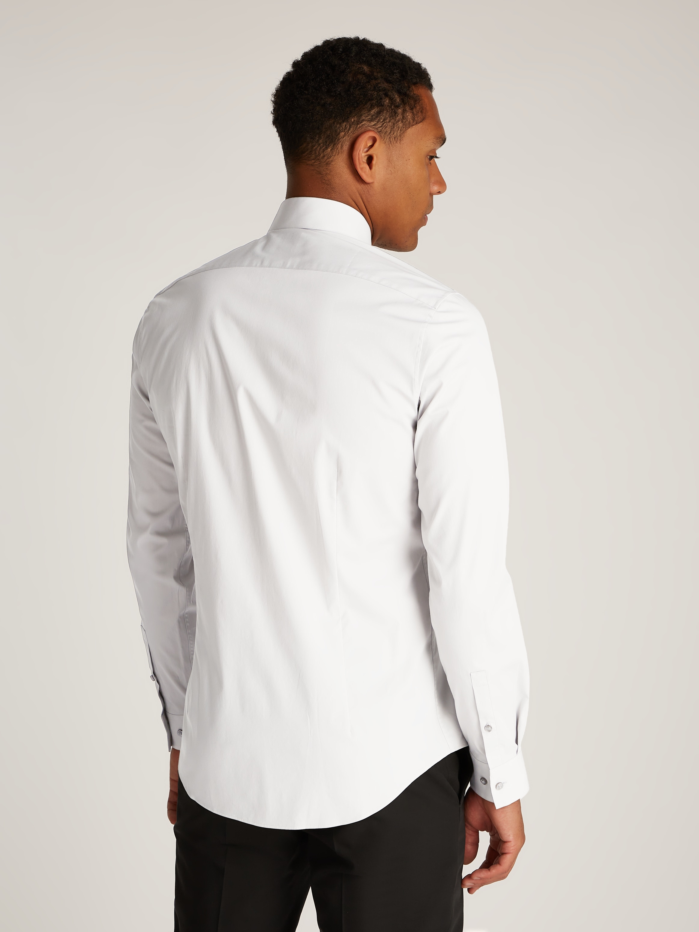 Calvin Klein Businesshemd »POPLIN STRETCH SLIM SHIRT« mit Kentkragen, Logoprint auf Brusthöhe