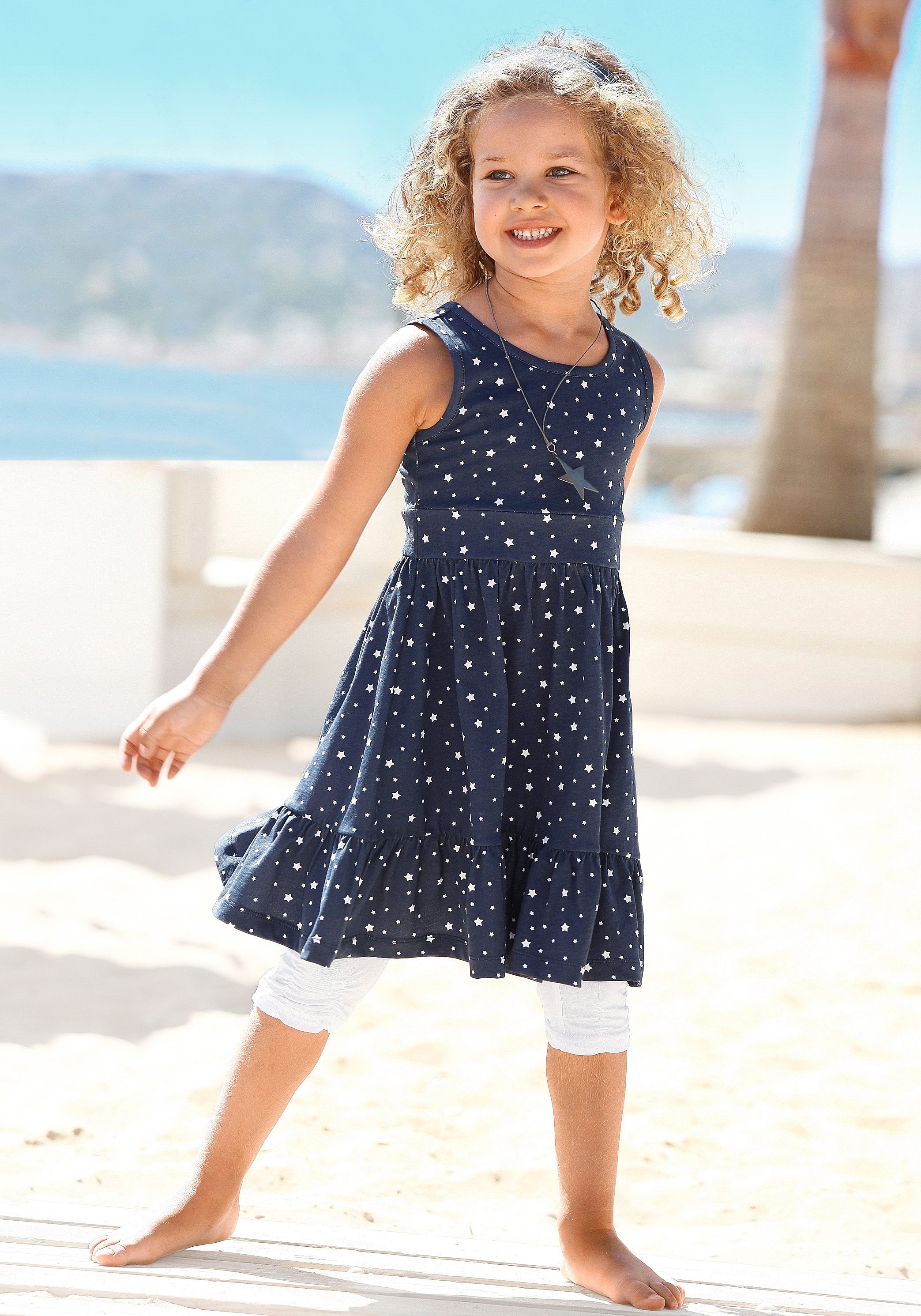 KIDSWORLD Jerseykleid »2tlg. Shirtkleid + Haarband im niedlichen Sternen-Allover«, (Set, 2 tlg.), festliche Anlässe, knielang, verspielter Stil, aus Baumwolle