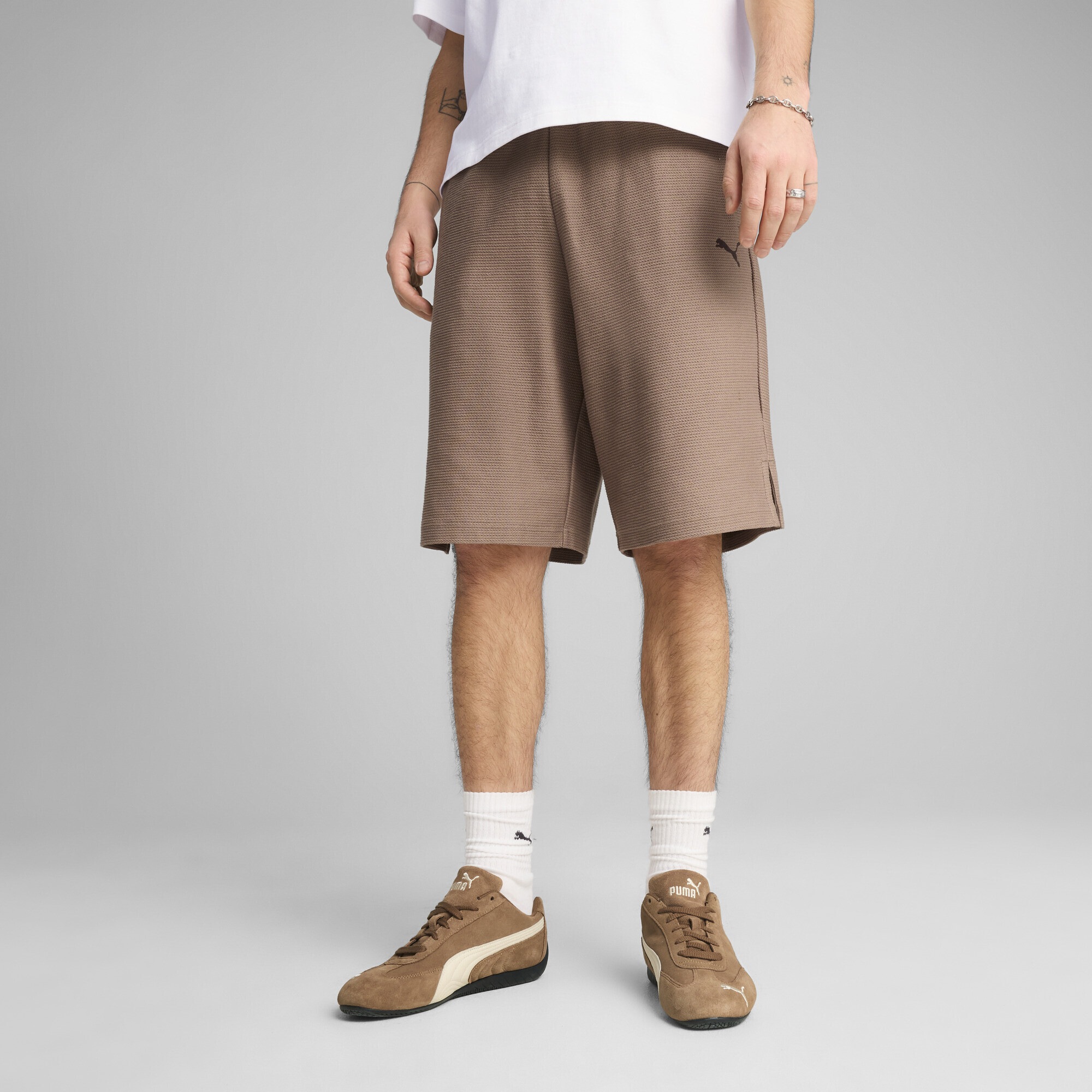 PUMA Sporthose »PREMIUM ESS Jacquard 11" Relaxed Lange Shorts Erwachsene«