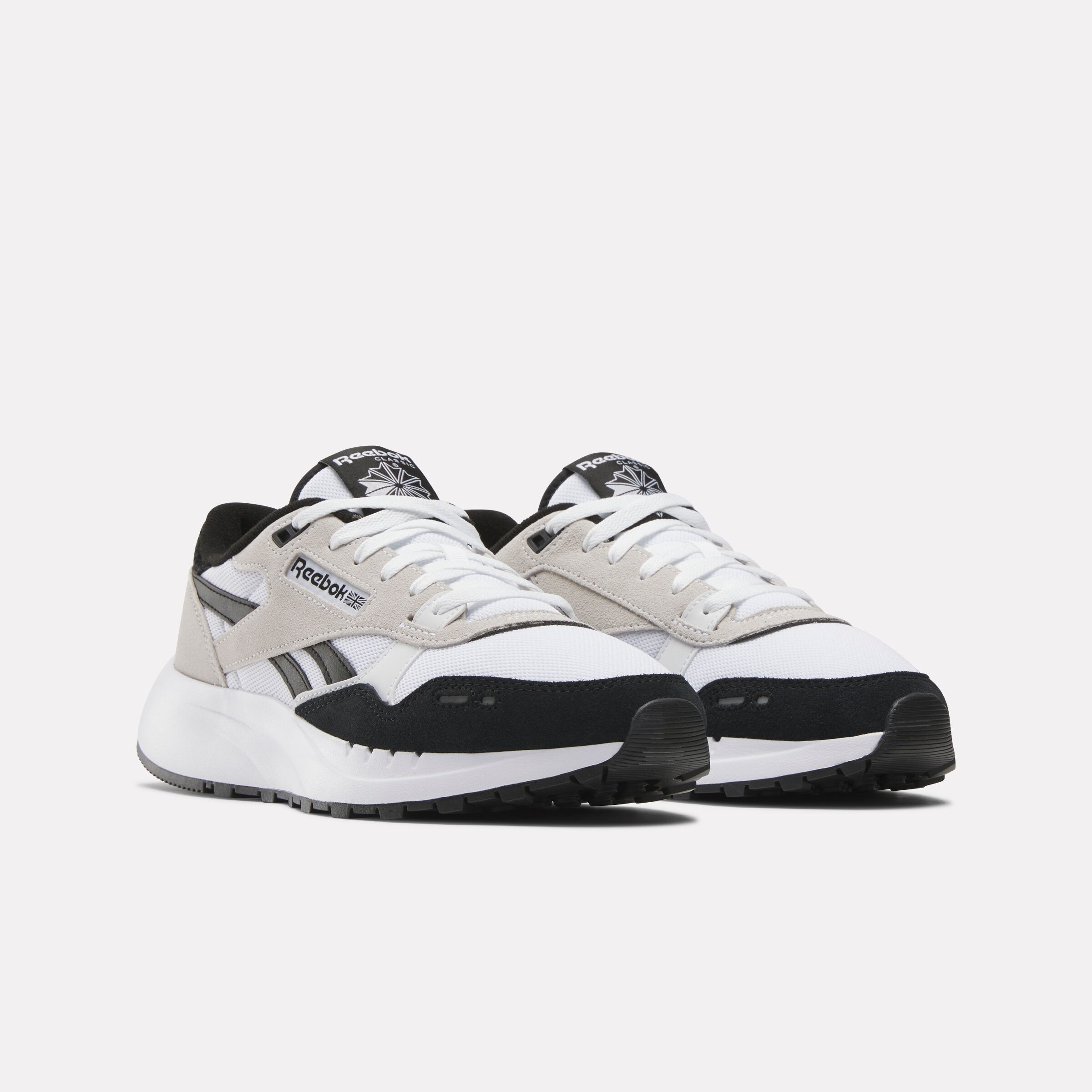 Black and white reebok shoes online