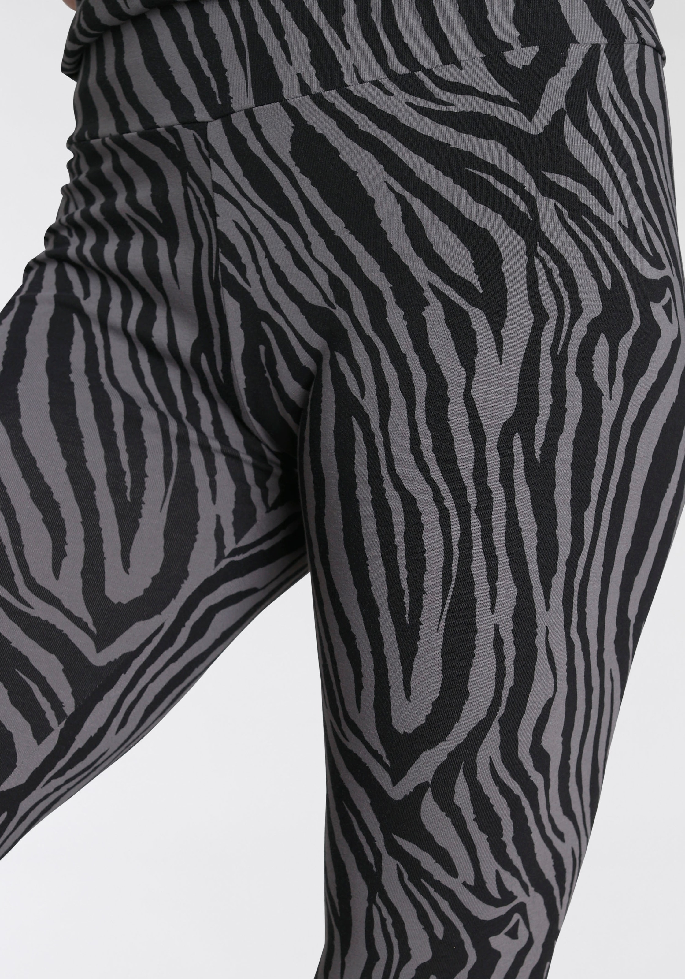 PUMA Leggings »ESS+ Tiger AOP Leggings«