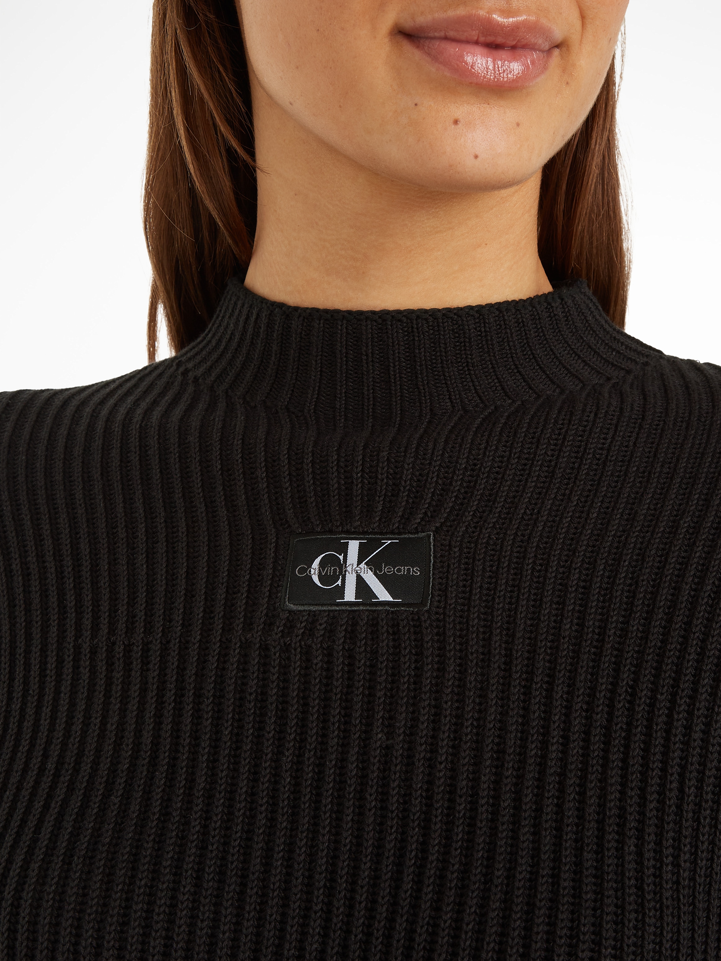 Calvin Klein Jeans Stehkragenpullover »WOVEN LABEL LOOSE SWEATER«, mit Logopatch