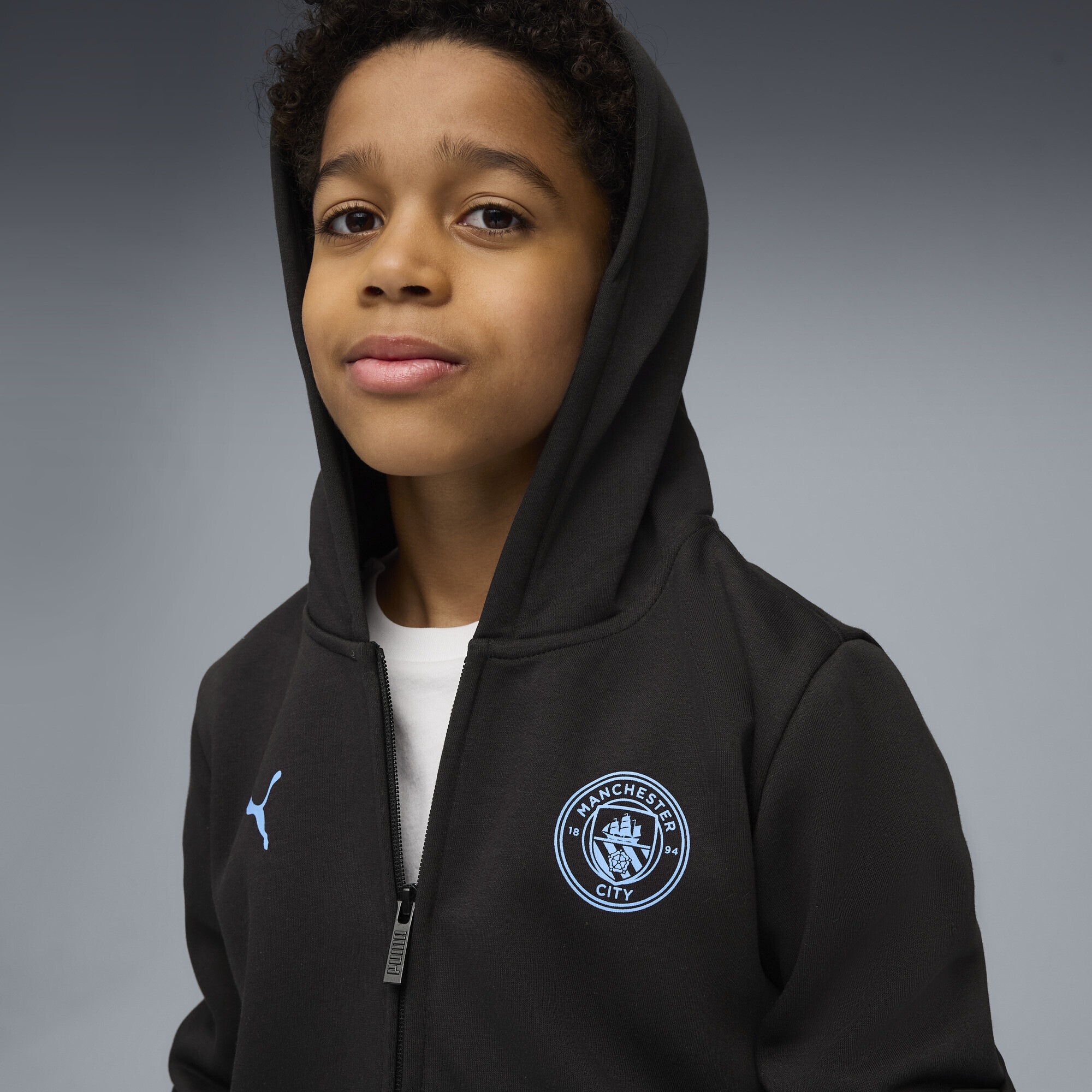 PUMA Sweatjacke »Manchester City FtblEssentials Kapuzenjacke Jugendliche«