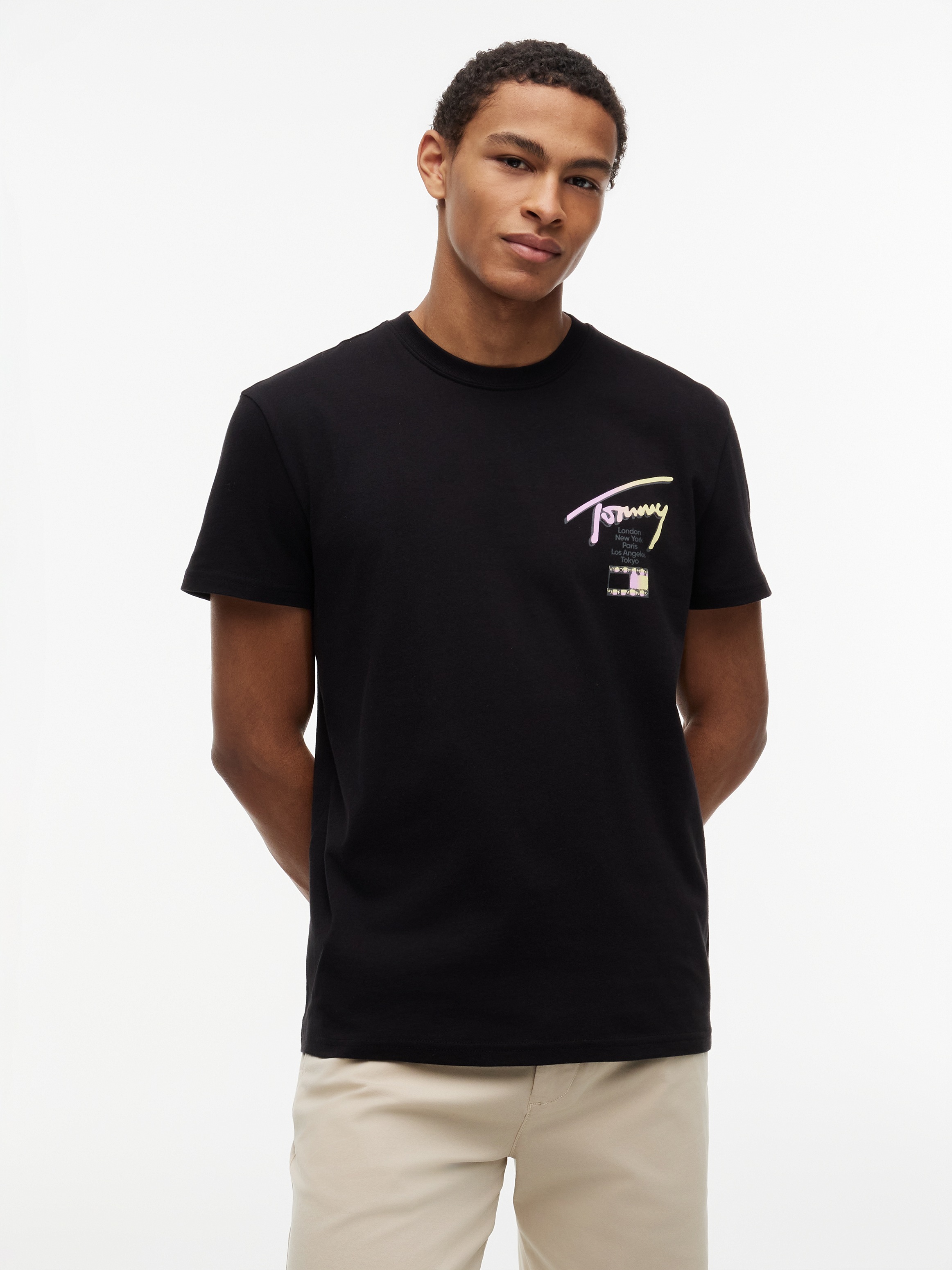 Tommy Jeans T-Shirt "TJM REGULAR CITY SIGNATURE" mit Tommy-Signatur-Logo auf dem Rücken