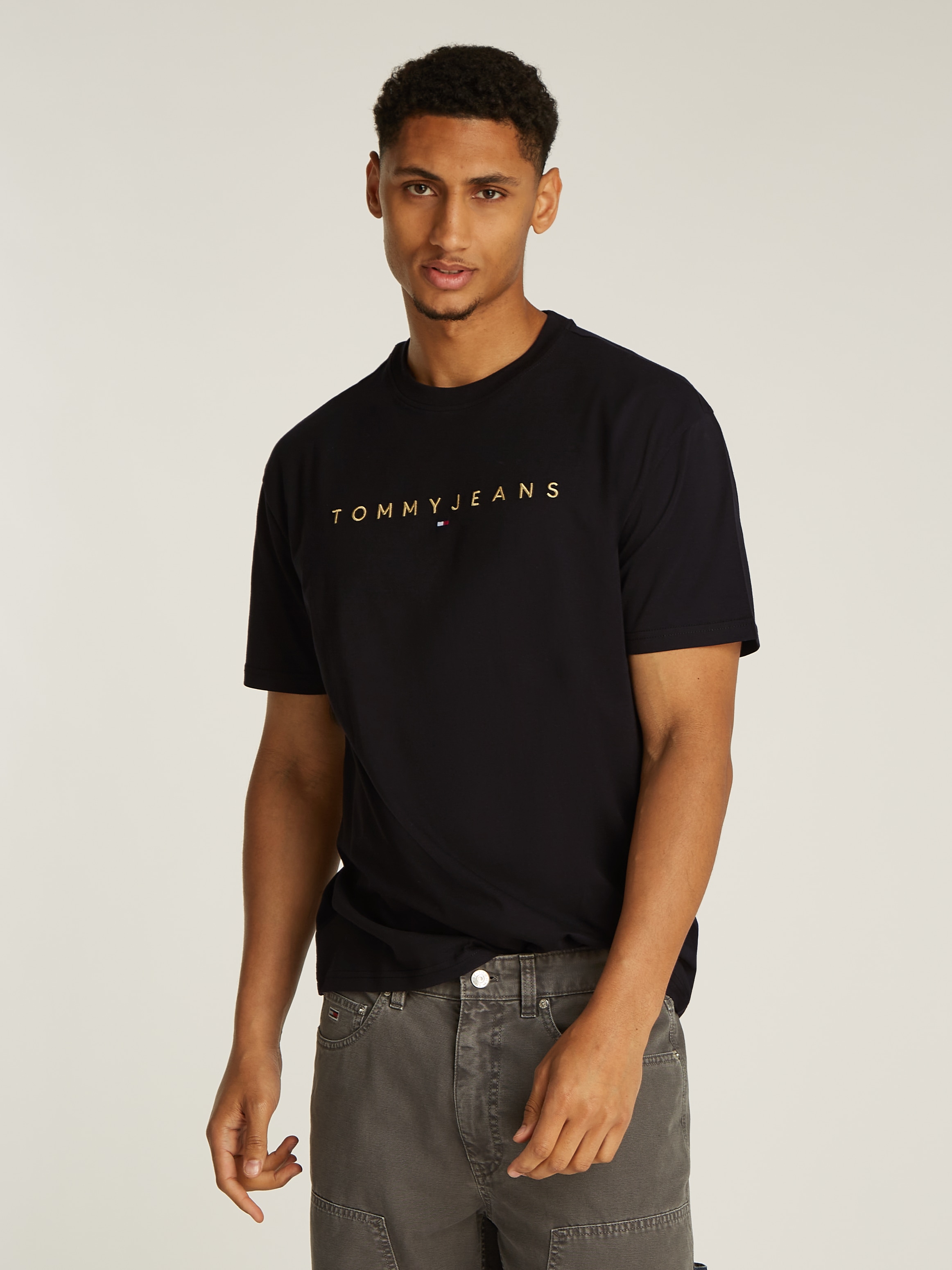 Tommy Jeans T-Shirt "TJM REG GOLD LINEAR LOGO TEE EXT" günstig online kaufen