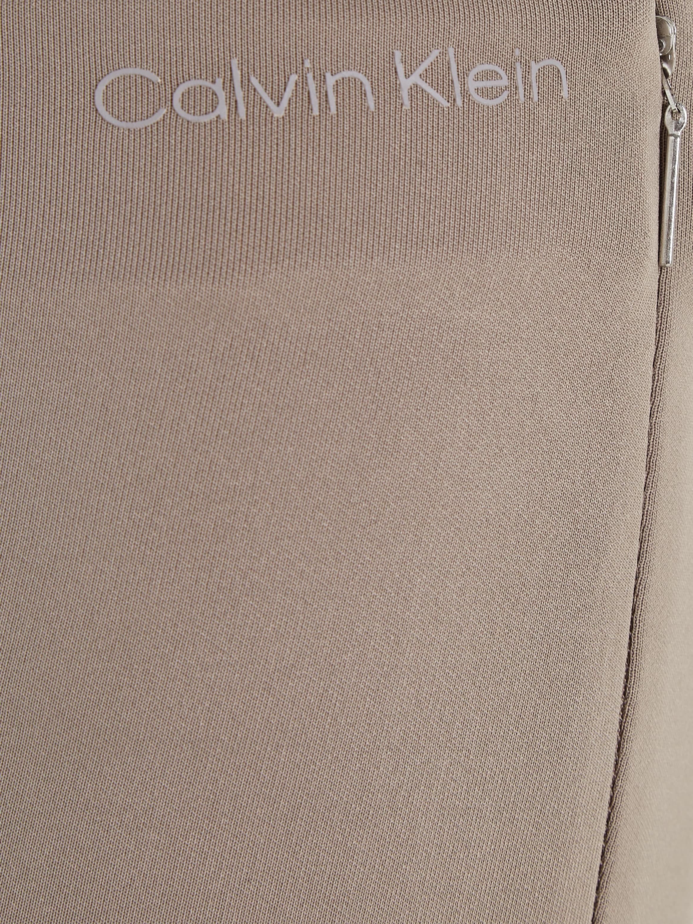 Calvin Klein Leggings »TECHNICAL KNIT LEGGING«, mit Reißverschluss am Beinabschluss