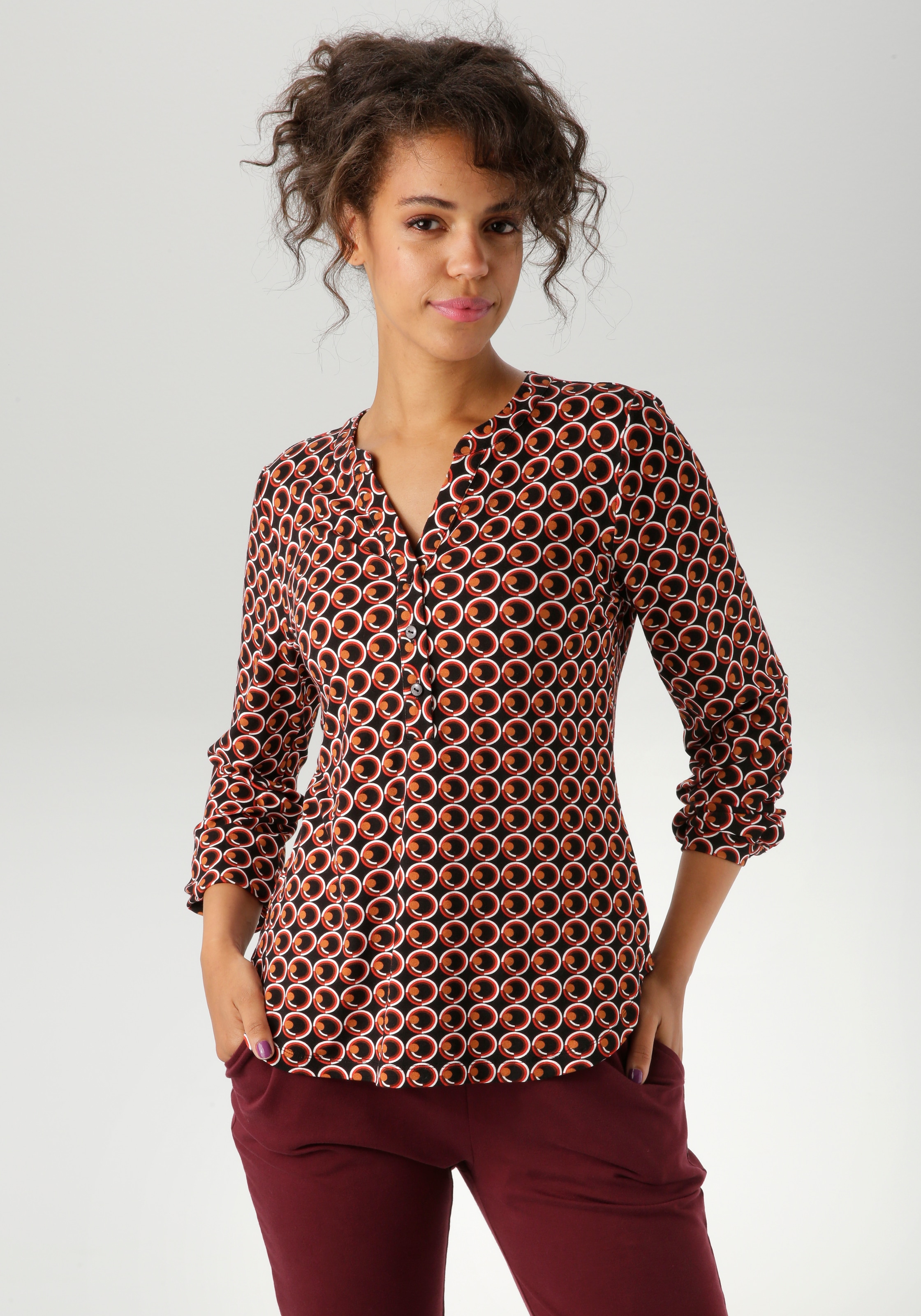 Aniston CASUAL Schlupfbluse mit ausdrucksvollem Retro-Druck günstig online kaufen