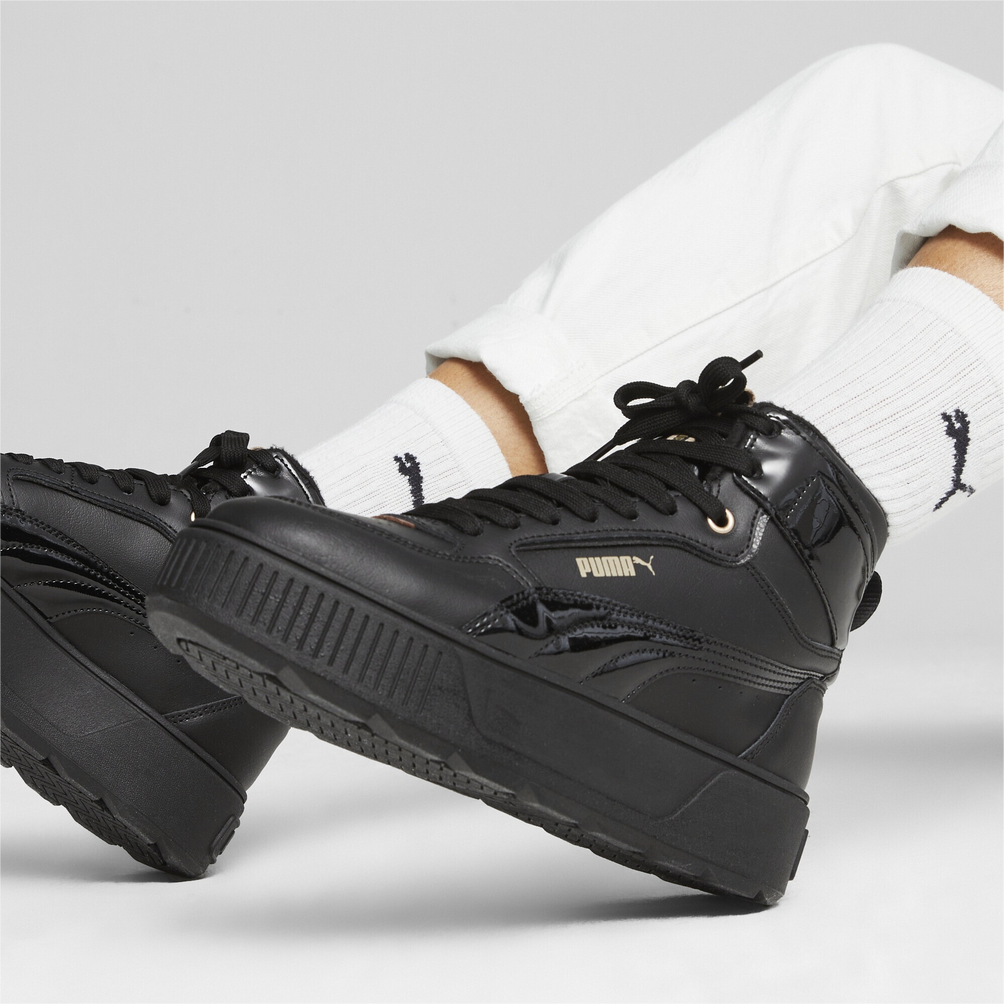 PUMA Sneaker »Karmen Rebelle Mid WTR Sneakers Damen«