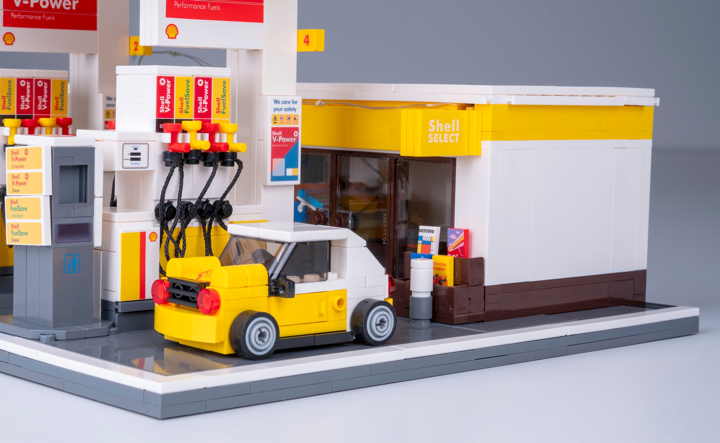 Jamara Konstruktions-Spielset »CaDA, Shell Tankstelle mit Shop und Waschanlage Bricks«, (1309 St.), mit LED Licht