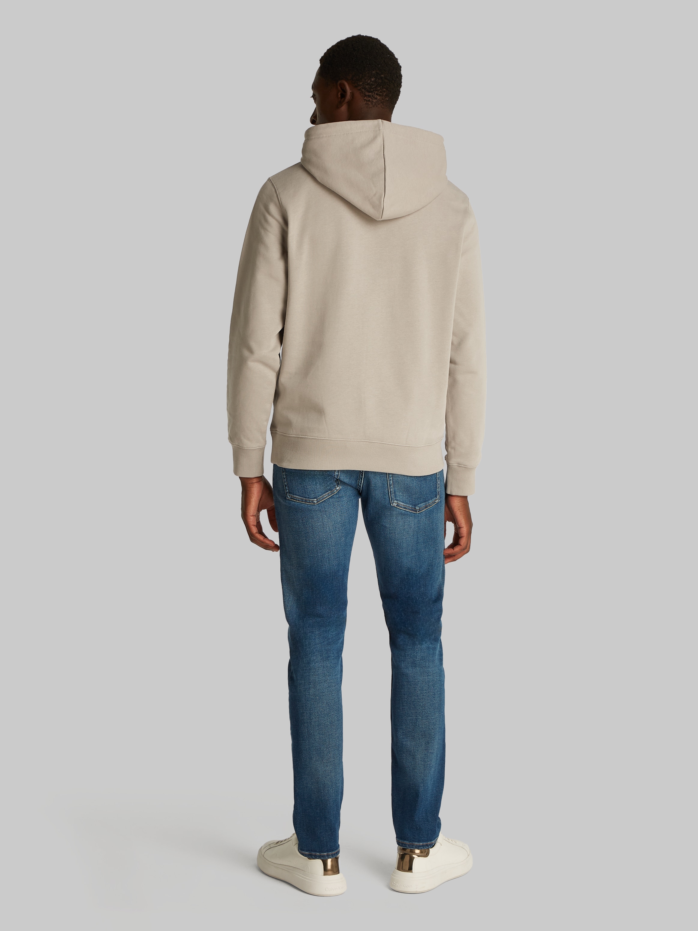 Calvin Klein Jeans Kapuzensweatshirt »SEASONAL MONOLOGO REGULAR HOODIE«, mit Logodruck und Stickerei