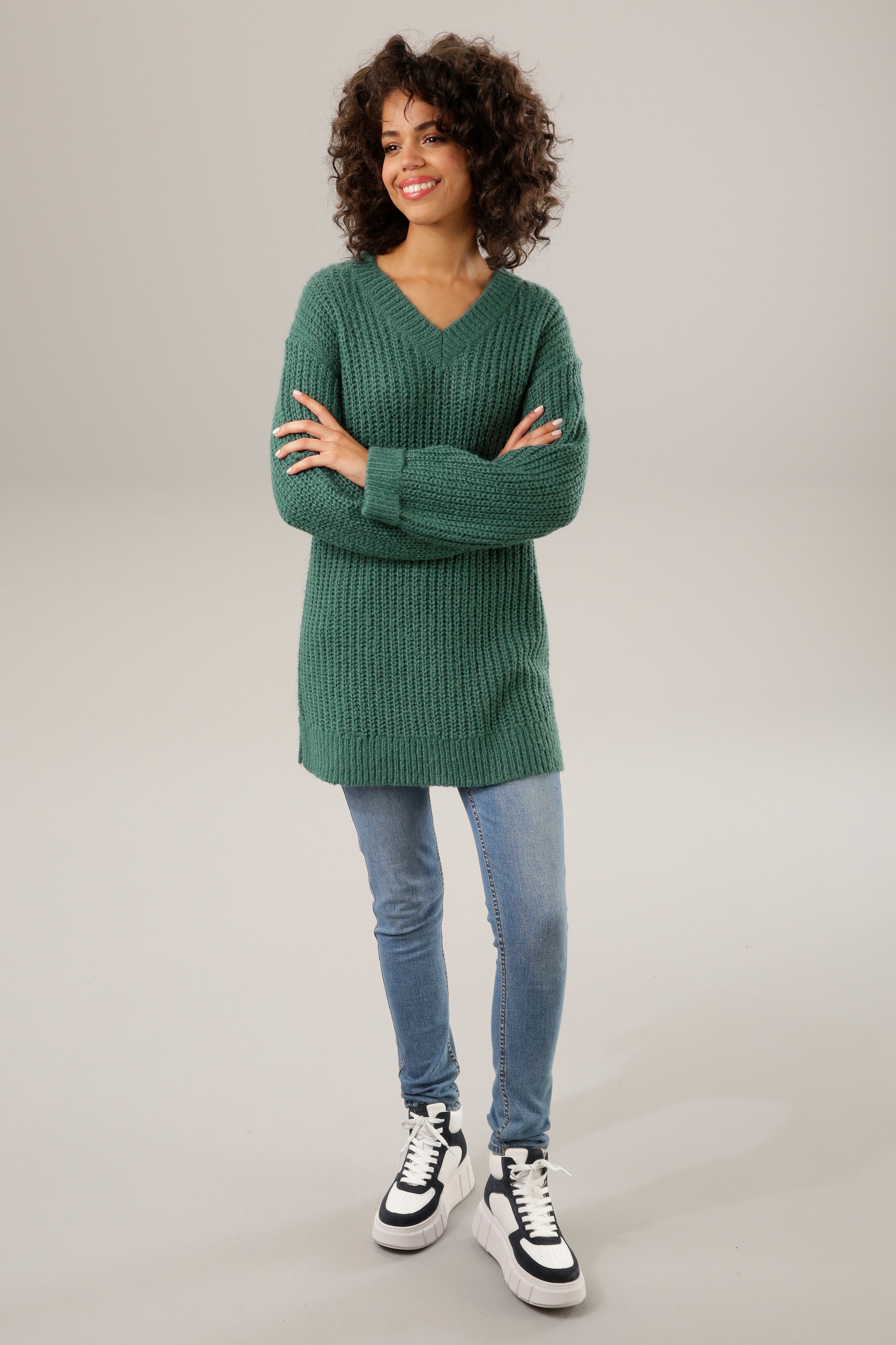 Aniston CASUAL Longpullover, mit fixierten Umschlag an den langen Ärmeln