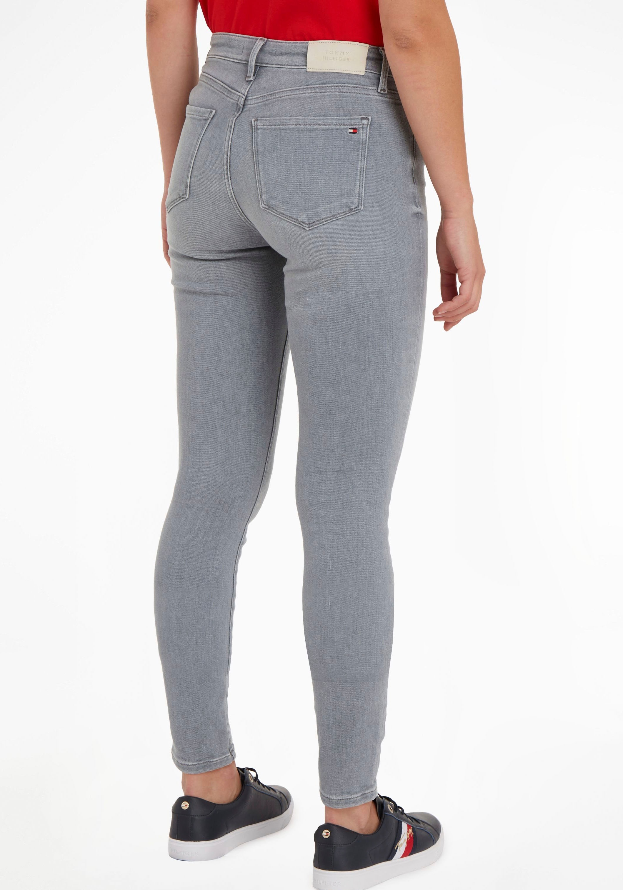 Tommy Hilfiger Skinny-fit-Jeans Tommy BAUR Brand-Features COMO vielen »TH FLEX Hilfiger online RW kaufen | mit IZZU«, SKINNY