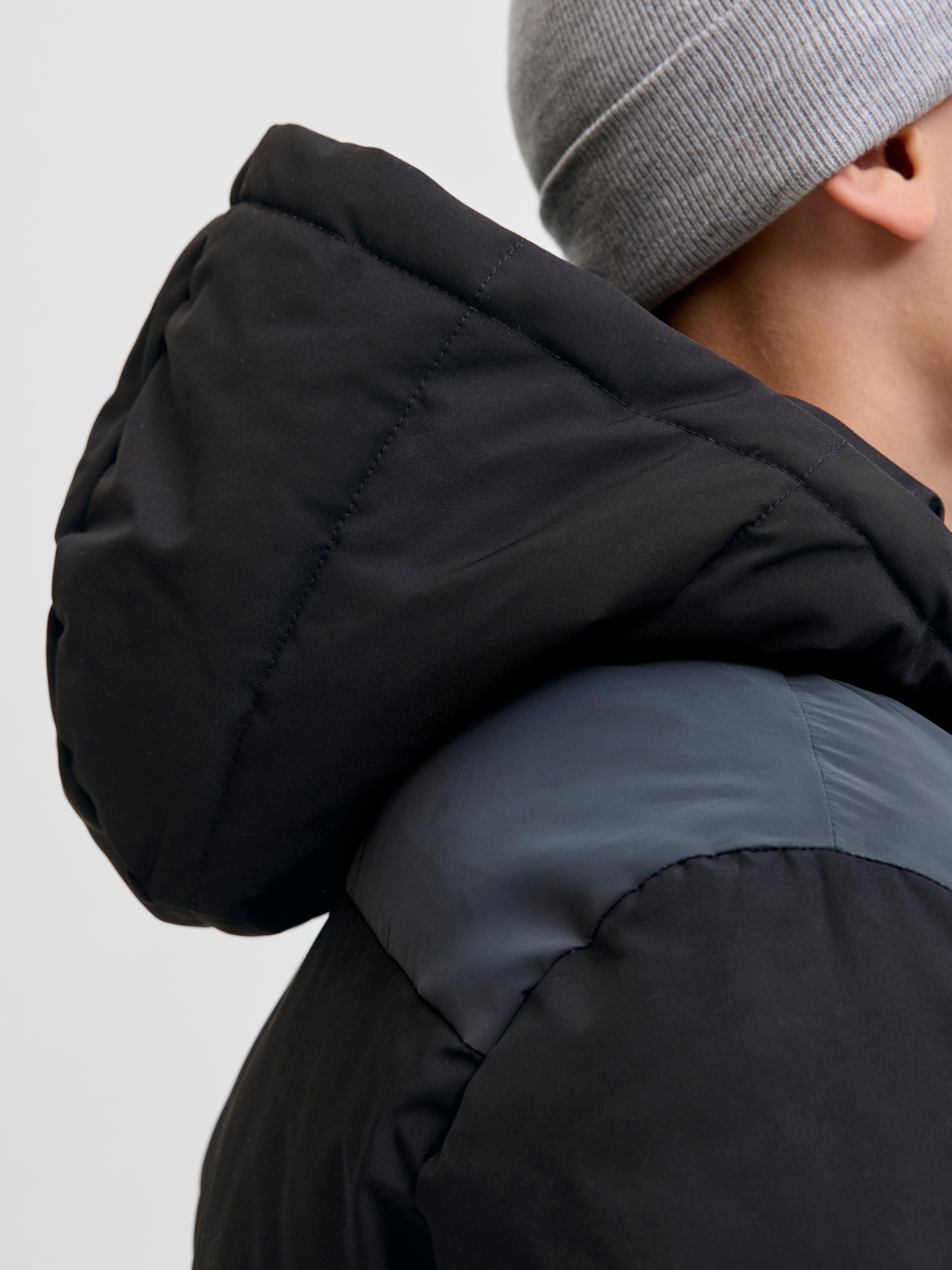 Thumbnail - Jack & Jones Junior Steppjacke "JJEOWEN REFLECTIVE PUFFER SN JNR" mit Kapuze