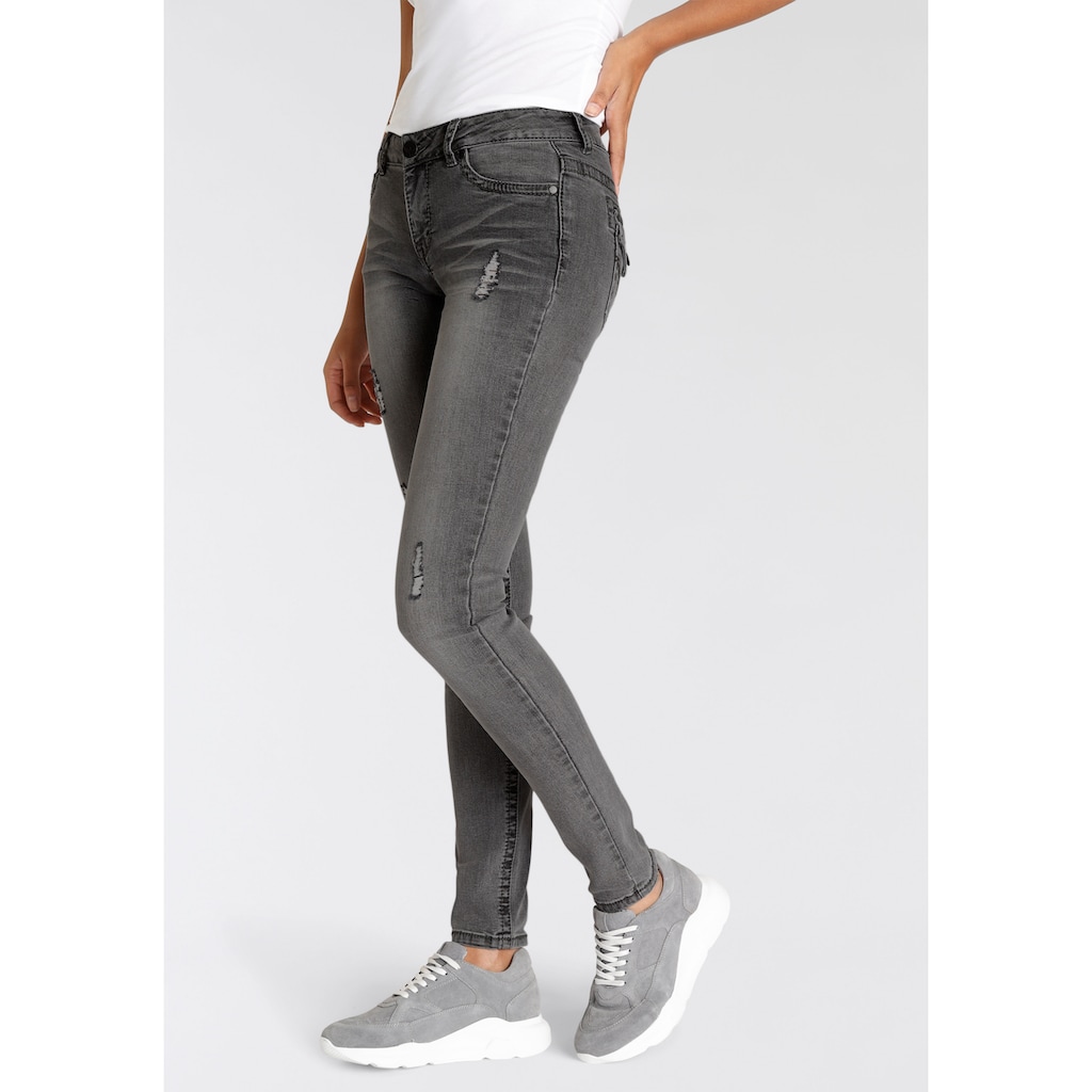 Arizona Skinny-fit-Jeans »mit Kontrastnähten und Pattentaschen«, Low Waist