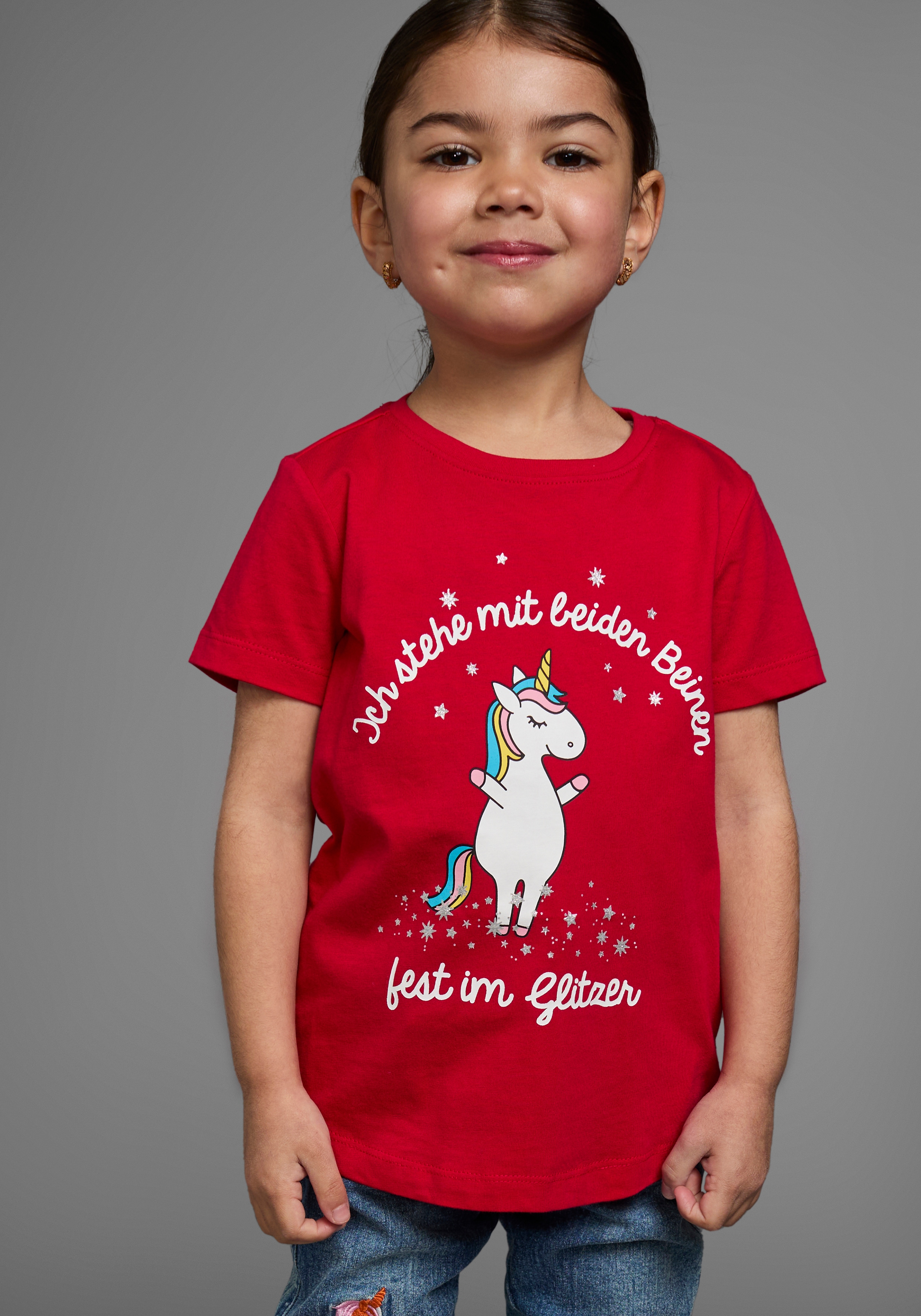 KIDSWORLD T-Shirt "Mit Einhorn-Druck und Glitzereffekten" mit stylischem Einhorn-Print