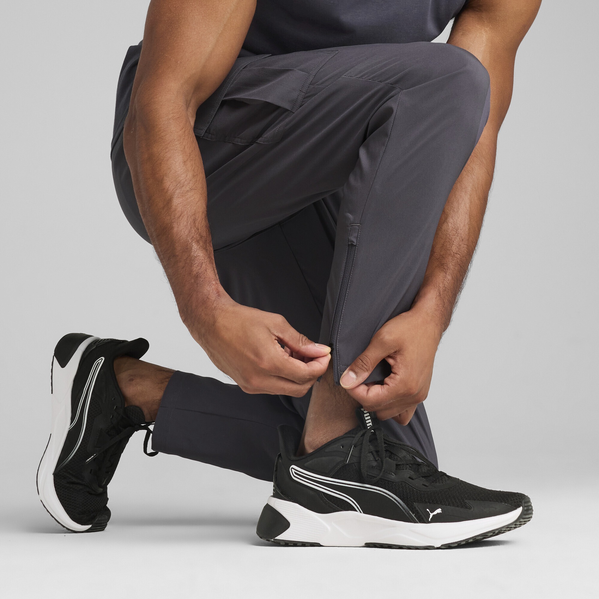 PUMA Trainingshose »TAD TECH Gewebte Cargohose Herren«