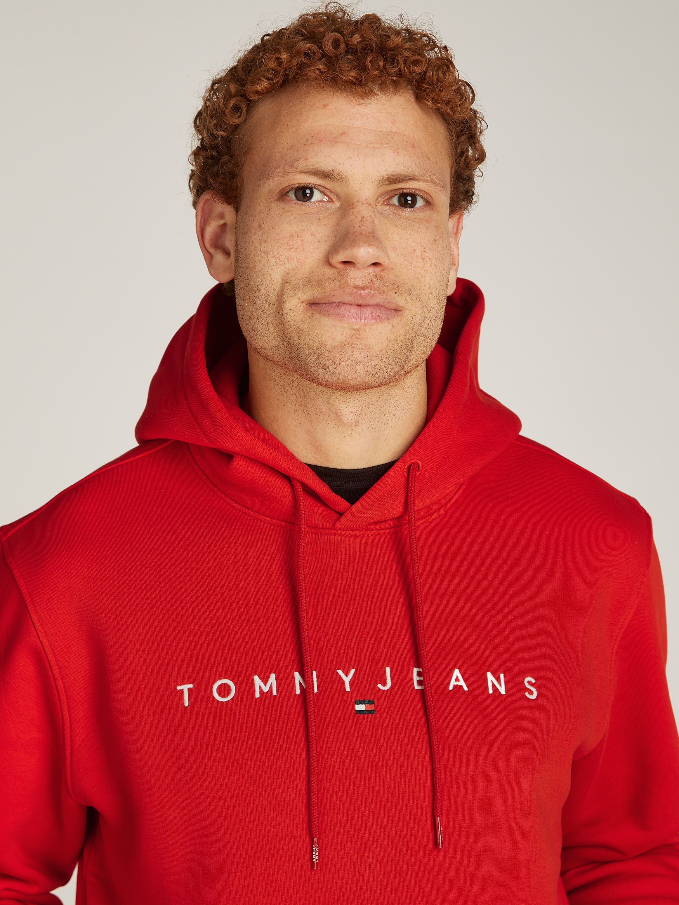 Tommy Jeans Kapuzensweatshirt »TJM REG LINEAR LOGO HOODIE EXT«, mit Kordel