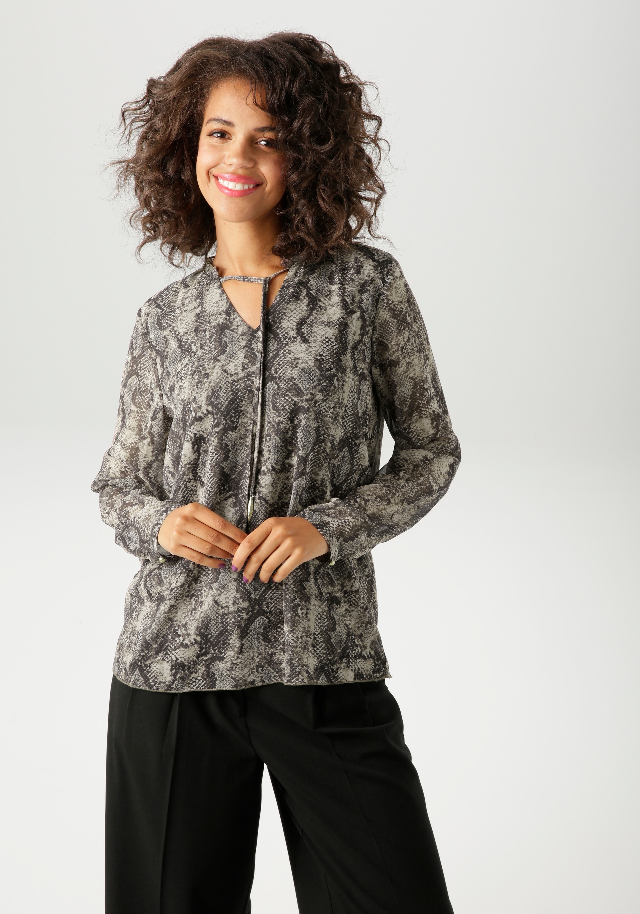 Aniston CASUAL Schlupfbluse mit trendigem Schlangendruck - jedes Teil ein U günstig online kaufen