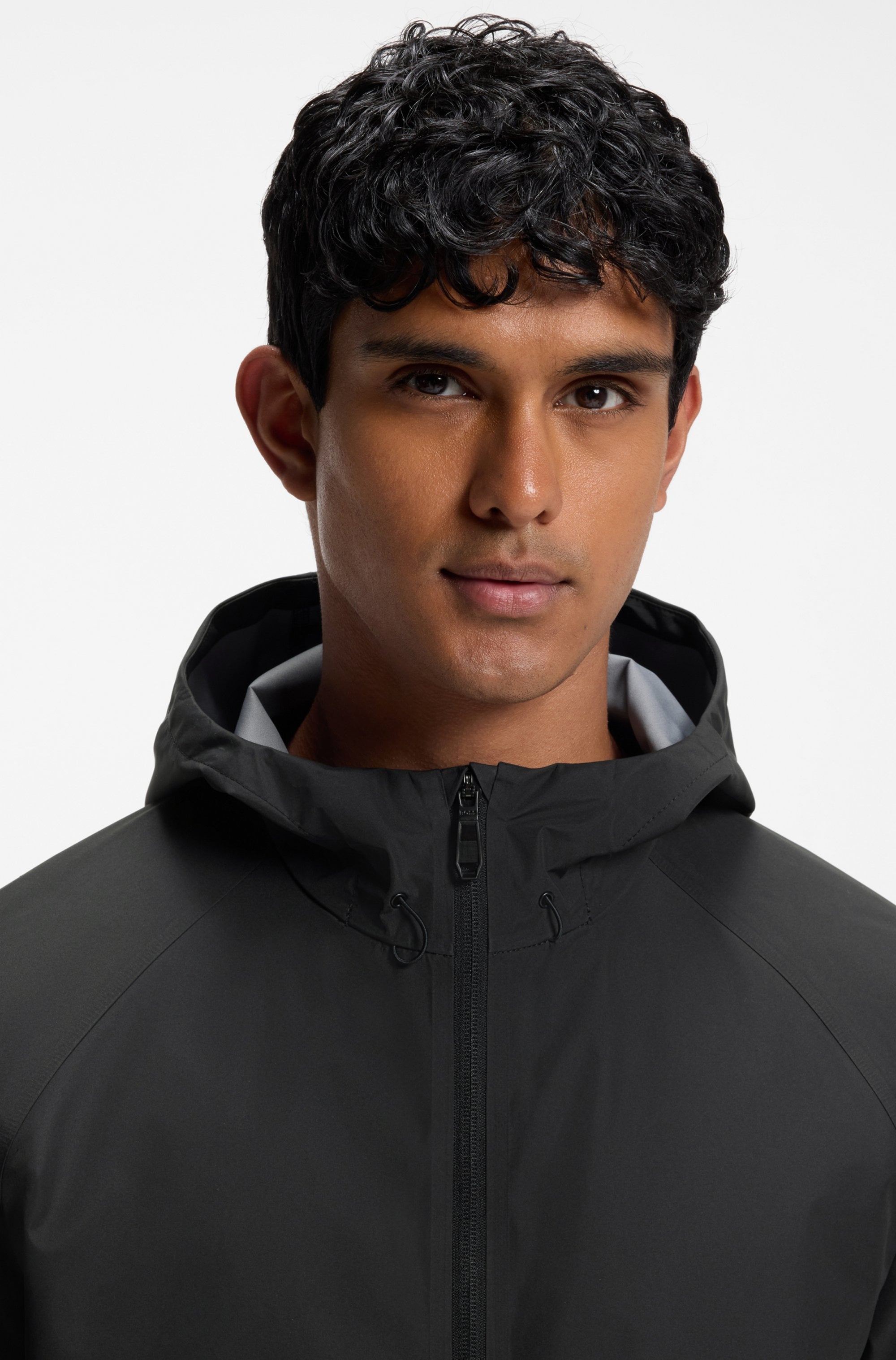 BOSS GREEN Regenjacke mit Kapuze wasserabweisende Ausrüstung, Regular Fit, Ärmeltasche