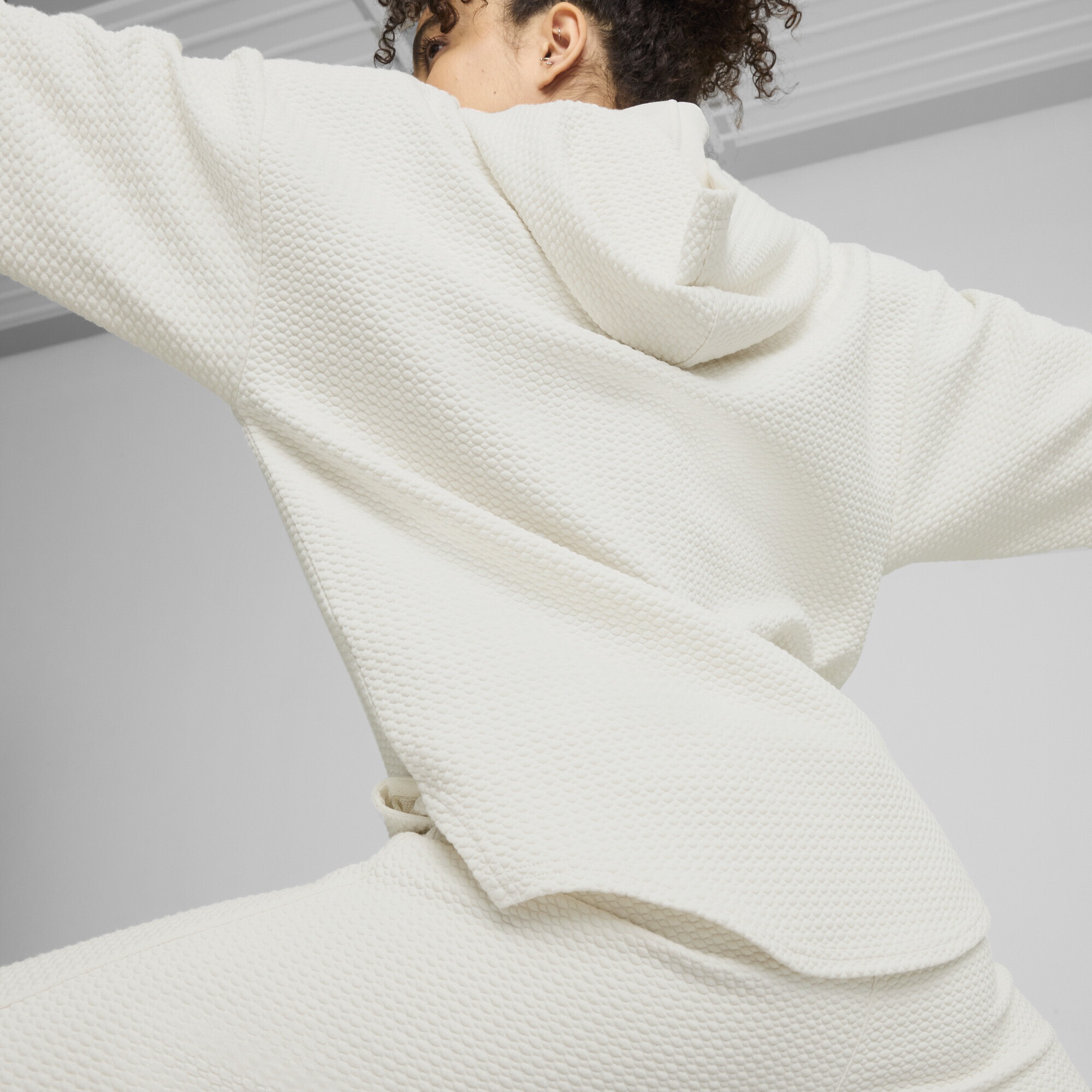 PUMA Kapuzenpullover »STUDIO Textured Hoodie Damen«