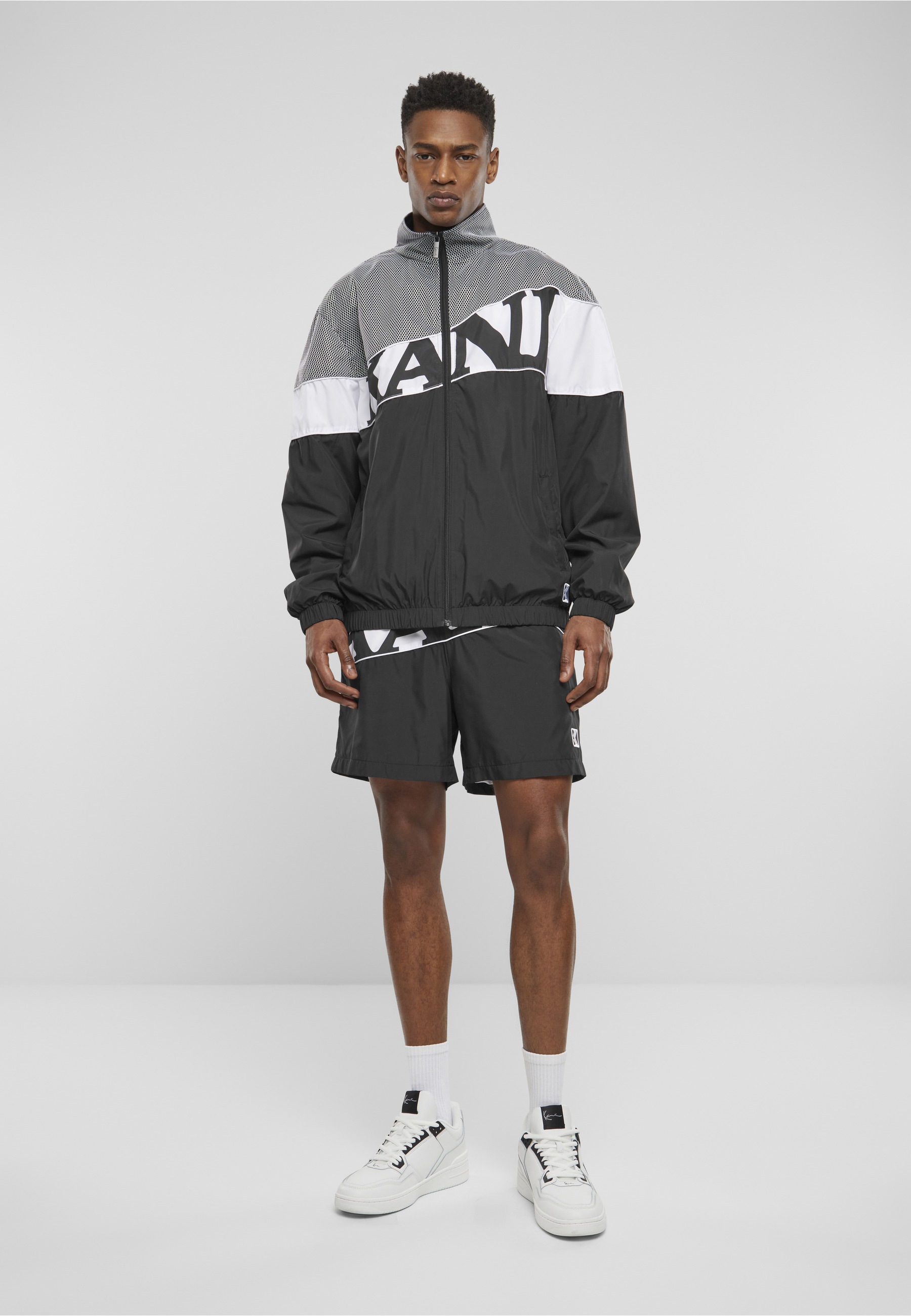 Karl Kani Trainingsjacke »Karl Kani Herren KM242-011-2 Wavy Retro Block Trackjacket« 1 Stk. tlg. ohne Kapuze