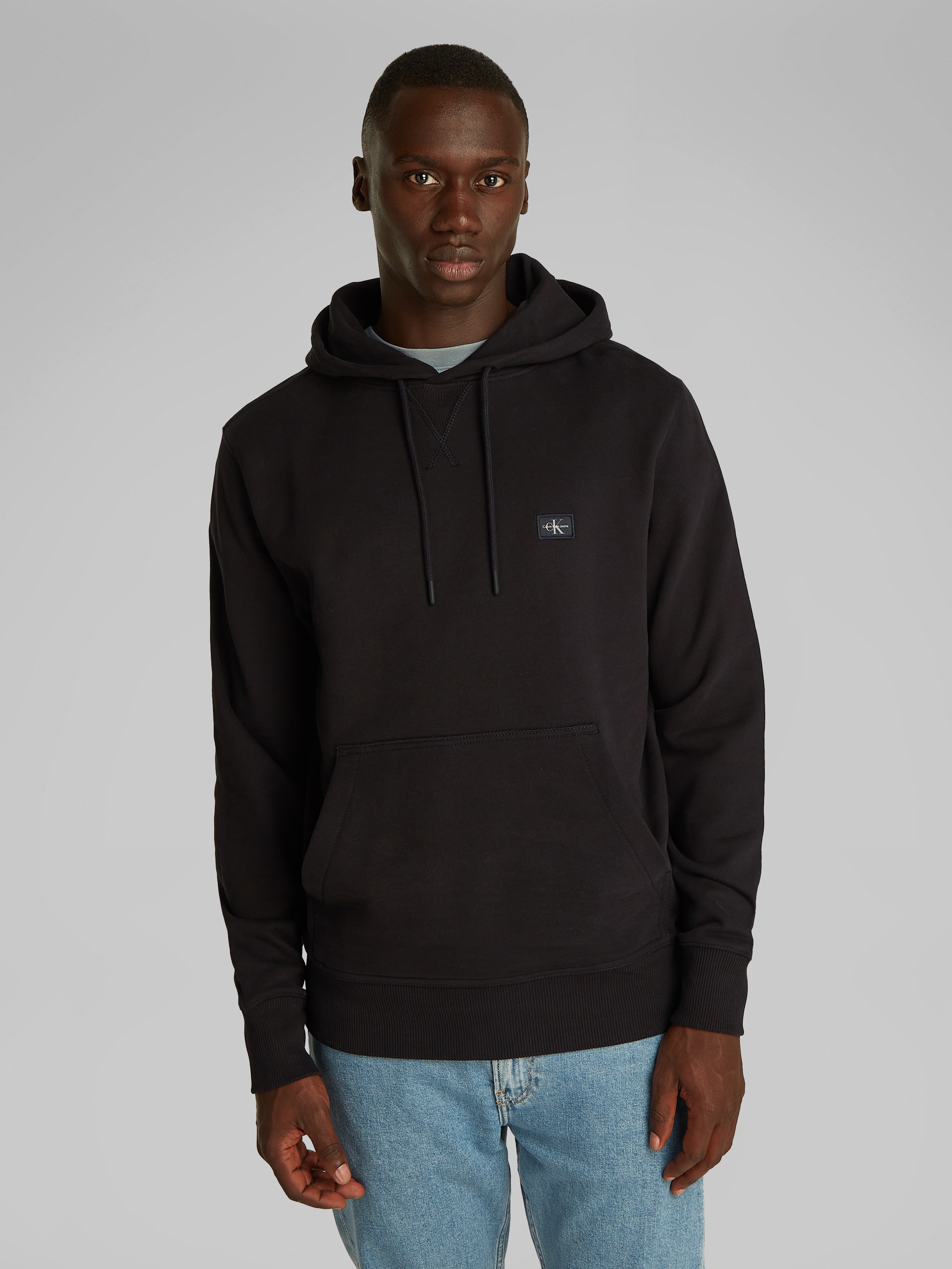 Calvin Klein Jeans Sweatshirt "WOVEN LABEL HOODIE", Kängurutasche, Logostic günstig online kaufen