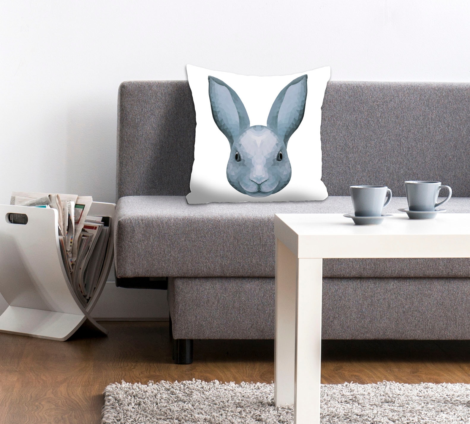 queence Dekokissen "Ikarus" mit einem blauen Hasen günstig online kaufen