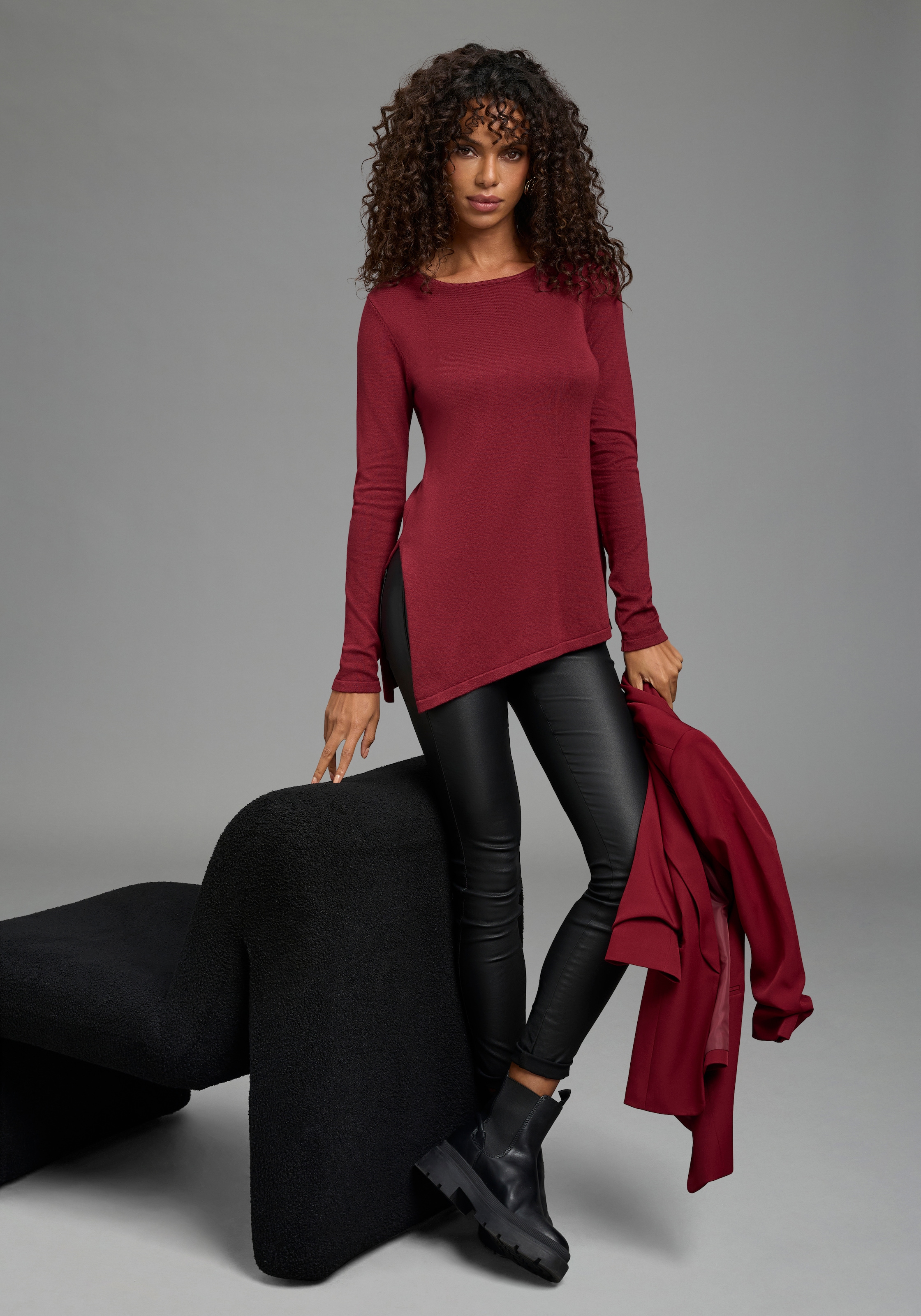 Bruno Banani Strickpullover »mit asymmetrischem Saum und seitlichem Schlitz« Rundhalsausschnitt, hüftbedeckende Länge, figurbetonte Passform