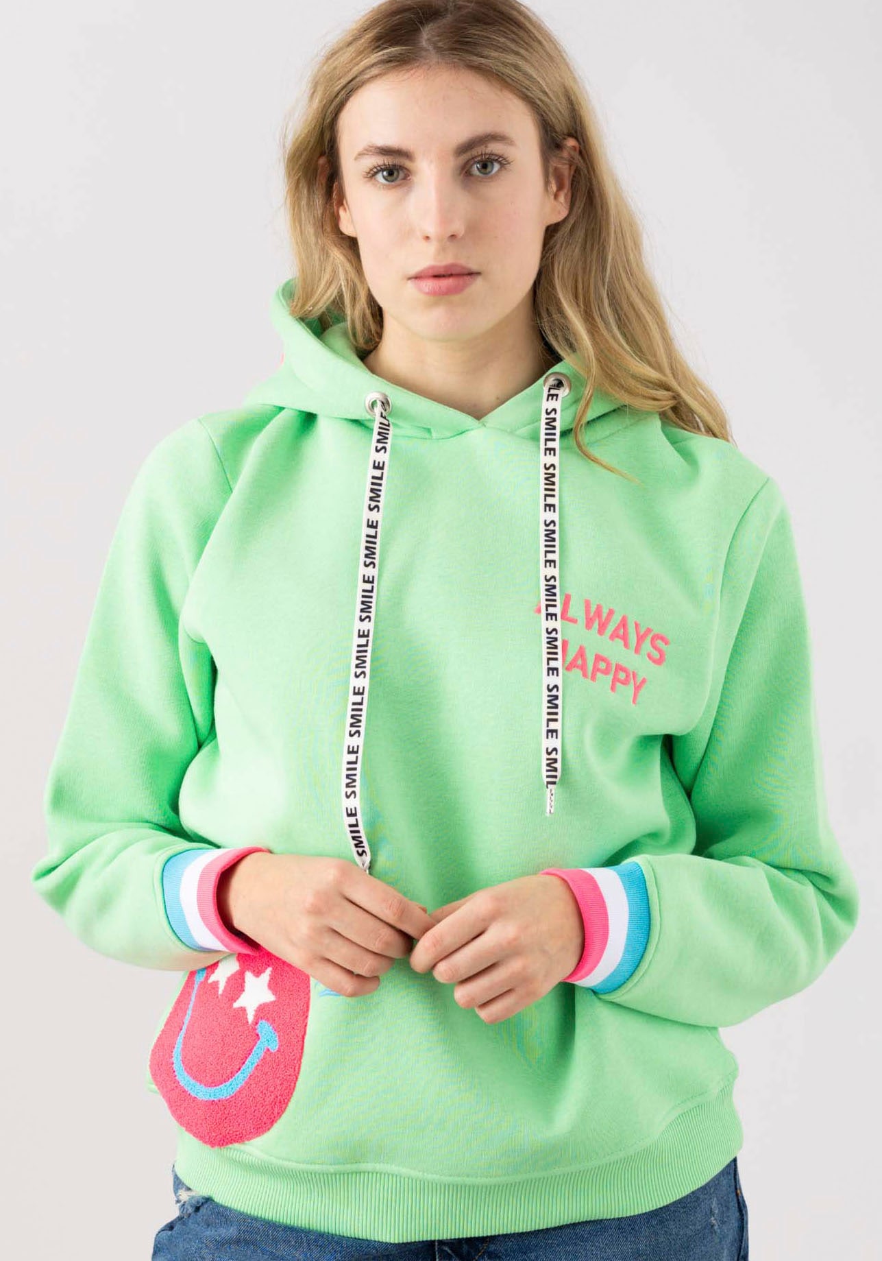Zwillingsherz Hoodie "Always Happy", Smiley aus Frottee, Neon-Details, Kapu günstig online kaufen