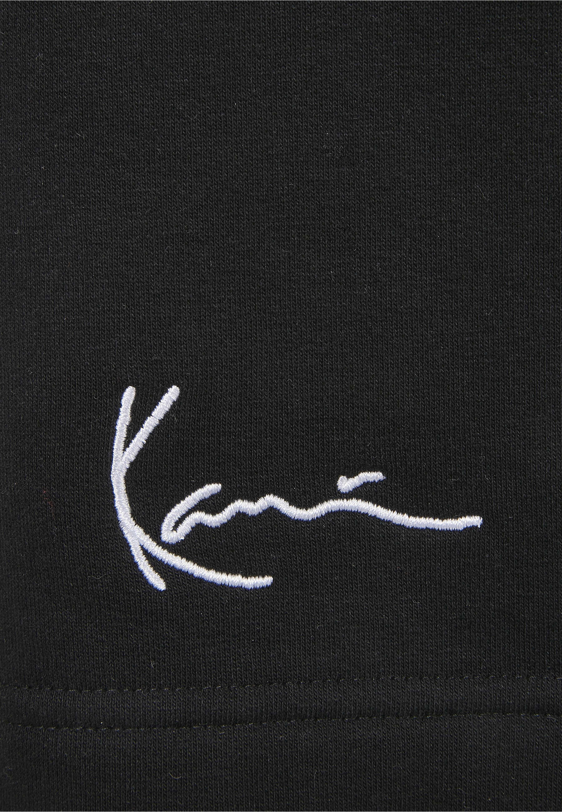 Karl Kani Stoffhose »Karl Kani Herren KKMQ22003BLK SIGNATURE SHORTS BLK«