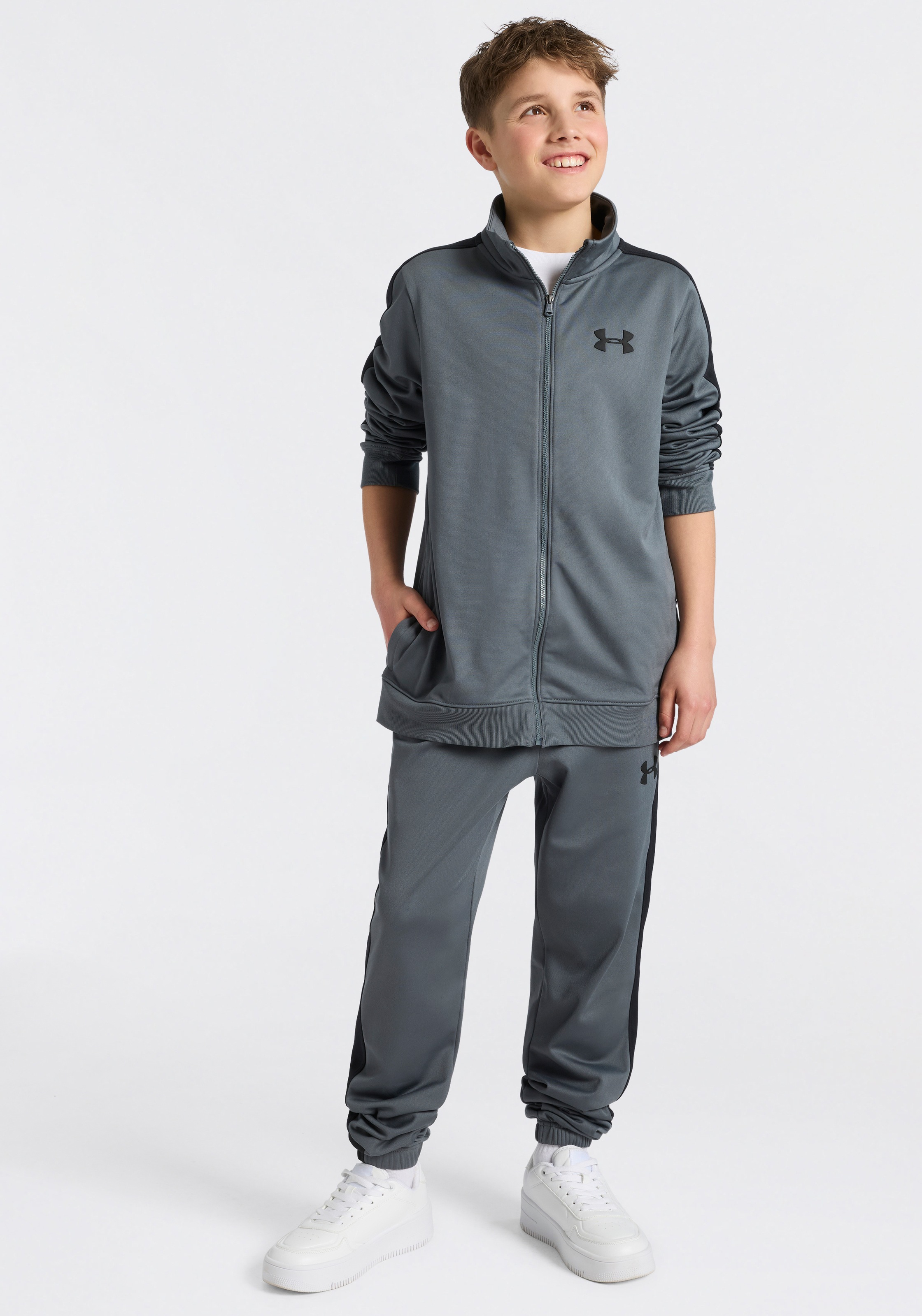 Trainingsanzug UNDER ARMOUR "UA RIVAL KNIT TRACK SUIT", Jungen, Gr. XL, pitch gray, schwarz, schwarz, Obermaterial: 100% Polyester, Sportanzüge Trainingsanzug, Für Kinder - Material innen weich angeraut