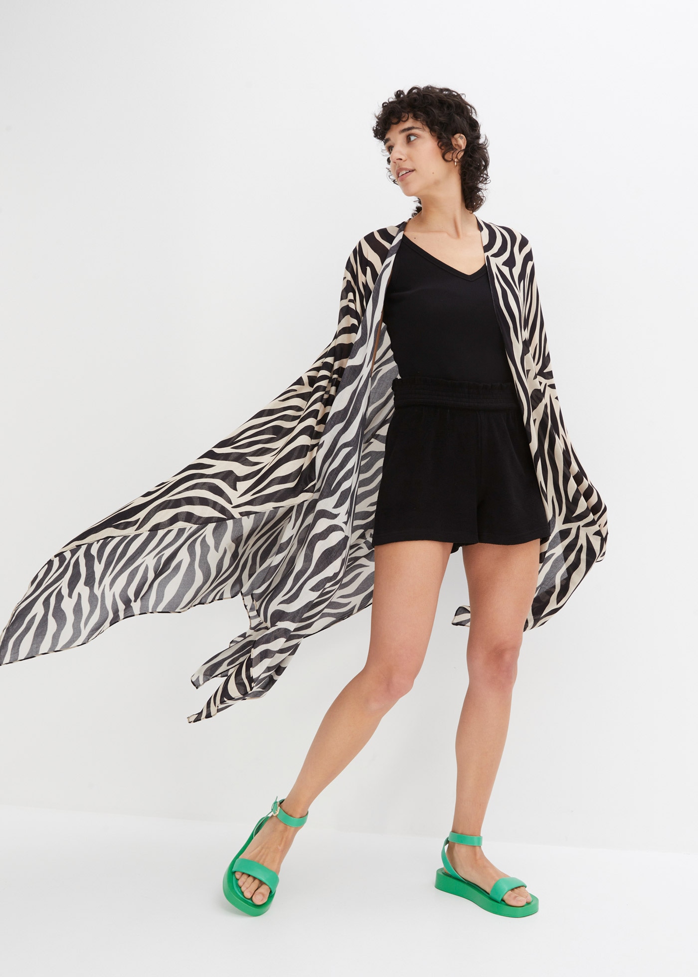 bonprix Strickponcho "Poncho" aus Viskose, mit Animal-Print, figurumspielen günstig online kaufen