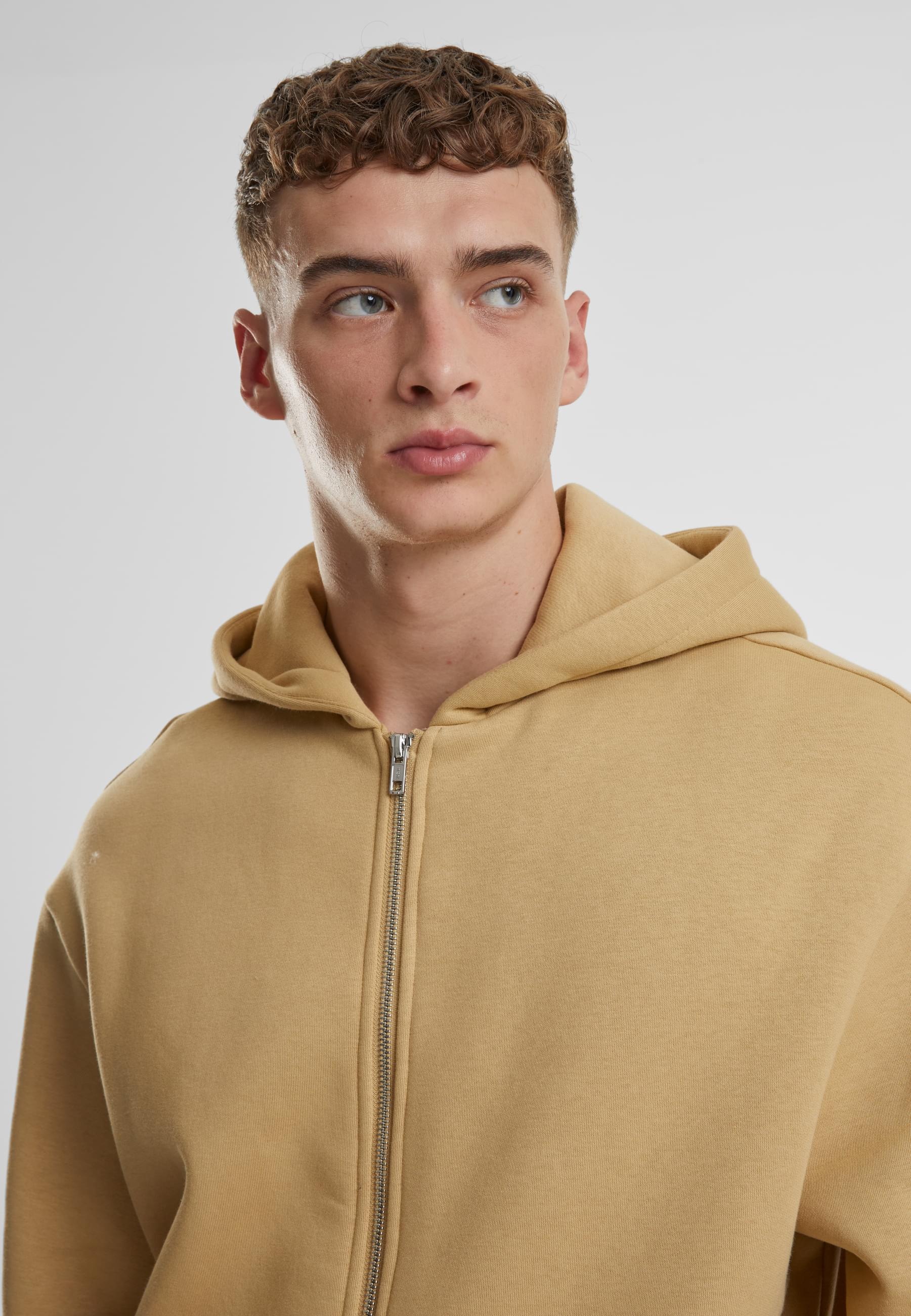 URBAN CLASSICS Outdoorjacke »Urban Classics Fluffy Zip Cardigan« 1 Stk. tlg. mit Kapuze