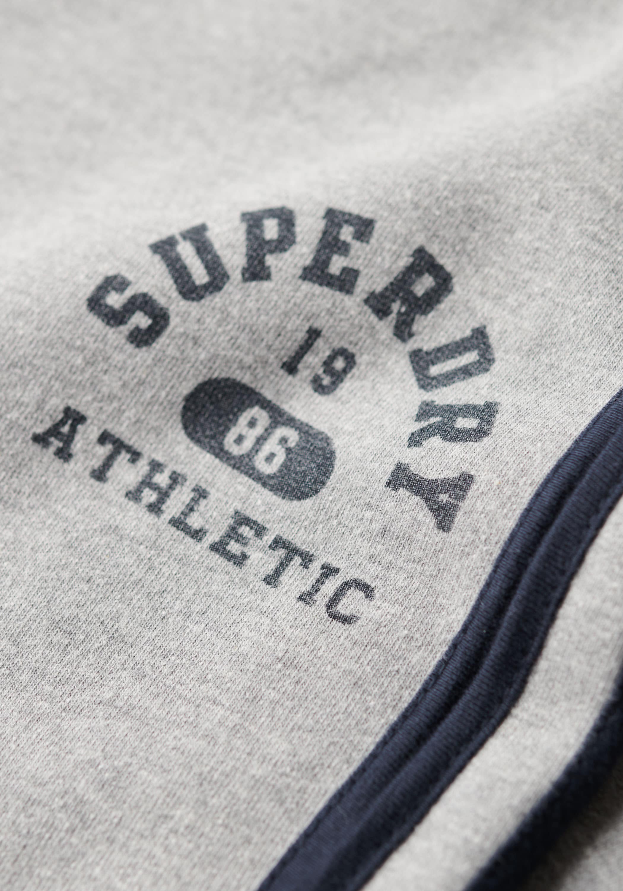 Superdry Sweathose »ATHLETIC STRIPE FLARE JOGGER«, Jogginghose mit Streifen und Schlag