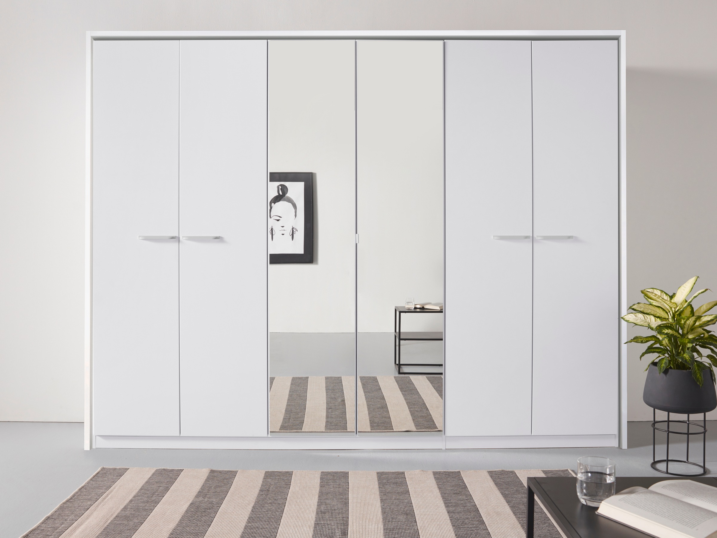 rauch Drehtürenschrank »Oteli«, mit Mittelspiegel und Passepartout optional mit Beleuchtung