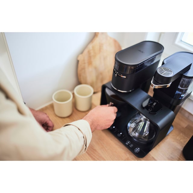 Melitta Kaffeemaschine mit Mahlwerk »EPOS® 1024-03 Schwarz/Silber  360°rotierender Wasserauslauf«, 1 l Kaffeekanne, Papierfilter, 1x4 | BAUR